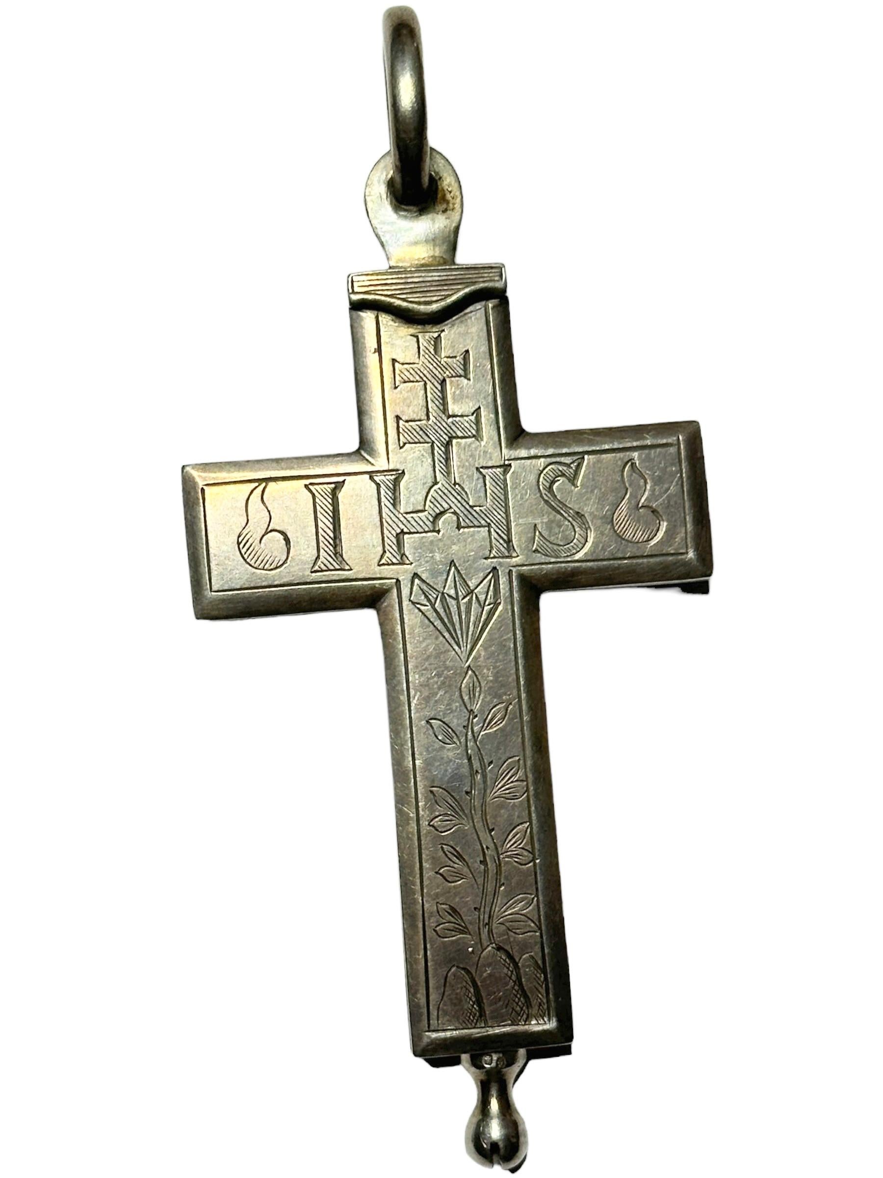 This antique reliquary contains relics of Saints with gilded paper rolls and red velvet. It is hand made of silver. Reliquary cross that opens and closes perfectly with its screw. 
The total weight can be seen in pictures. But to make sure i mention