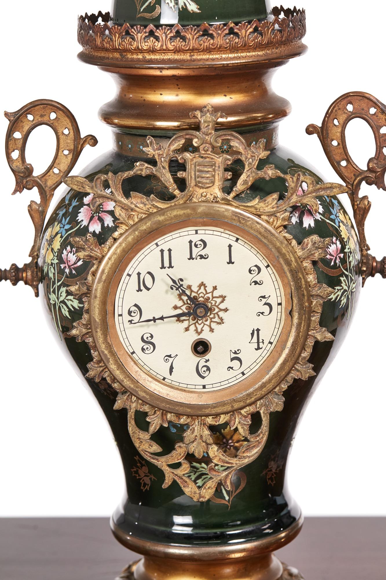Large French Antique Victorian mantel clock with a wonderfully painted ceramic body and beautiful brass mounts. A very attractive piece in good working order with original key.

 