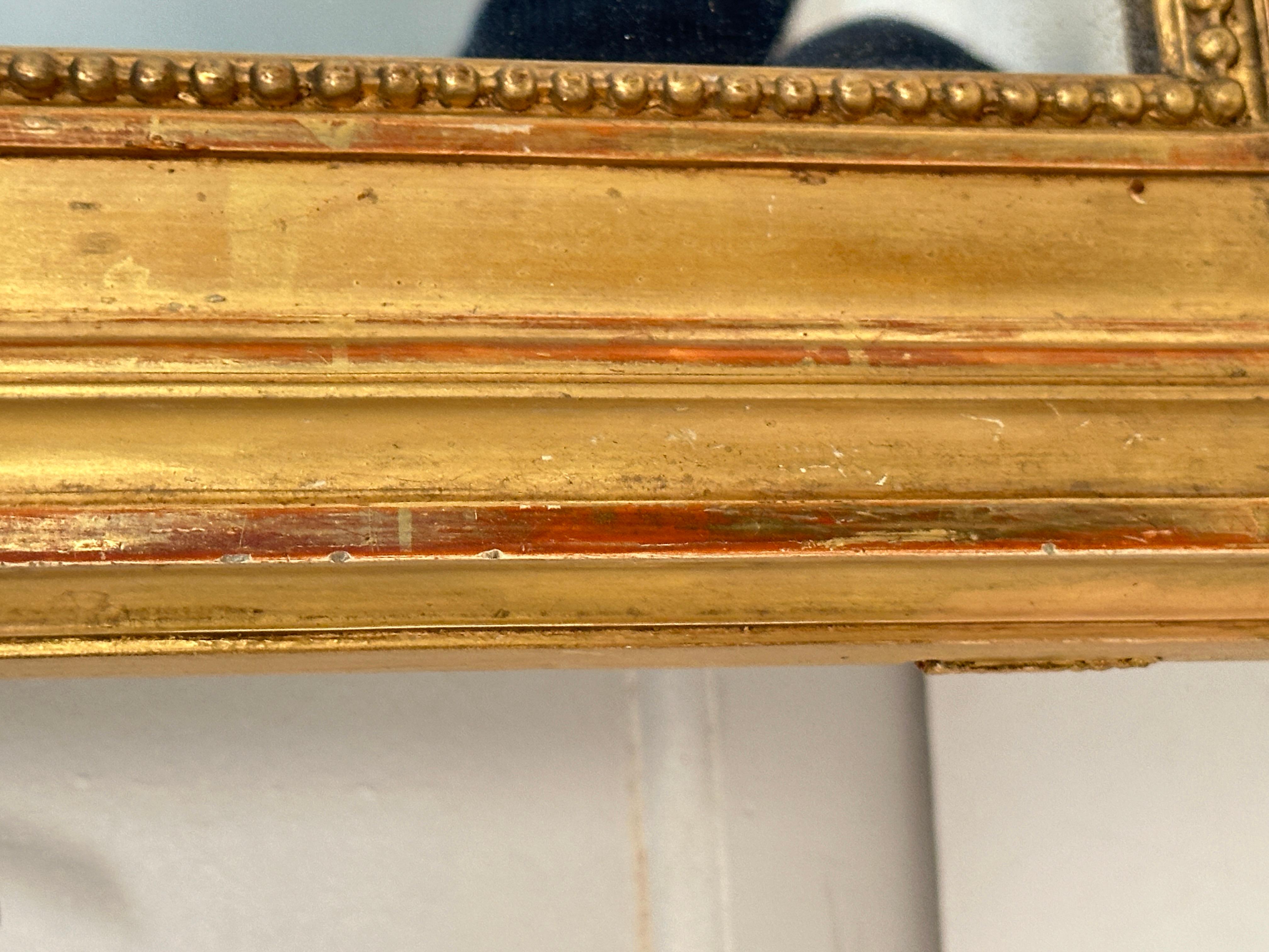 XIX secolo Grande specchio francese ad arco dorato (H. 54 1/4 x L. 32 3/4) in vendita