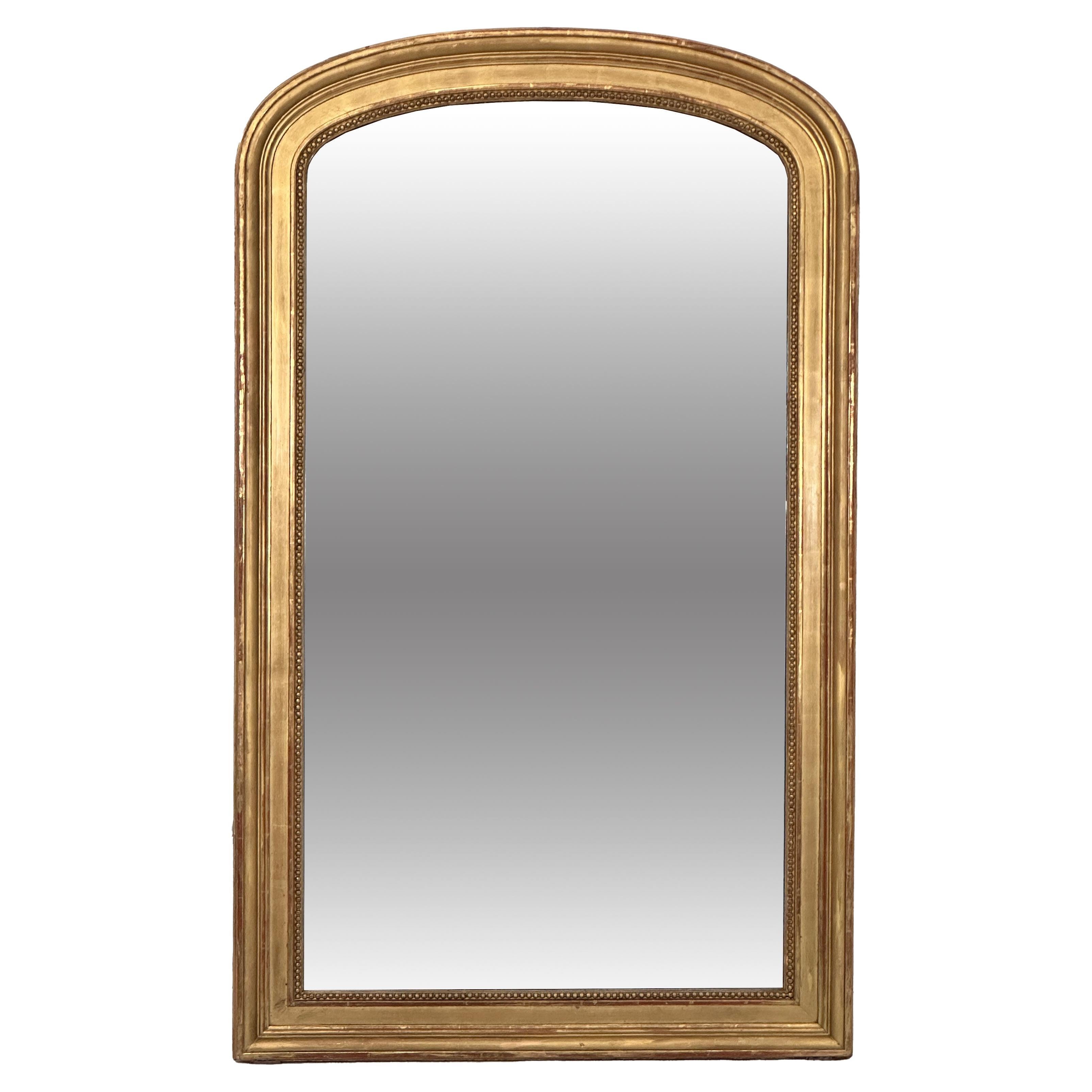 Grande specchio francese ad arco dorato (H. 54 1/4 x L. 32 3/4)