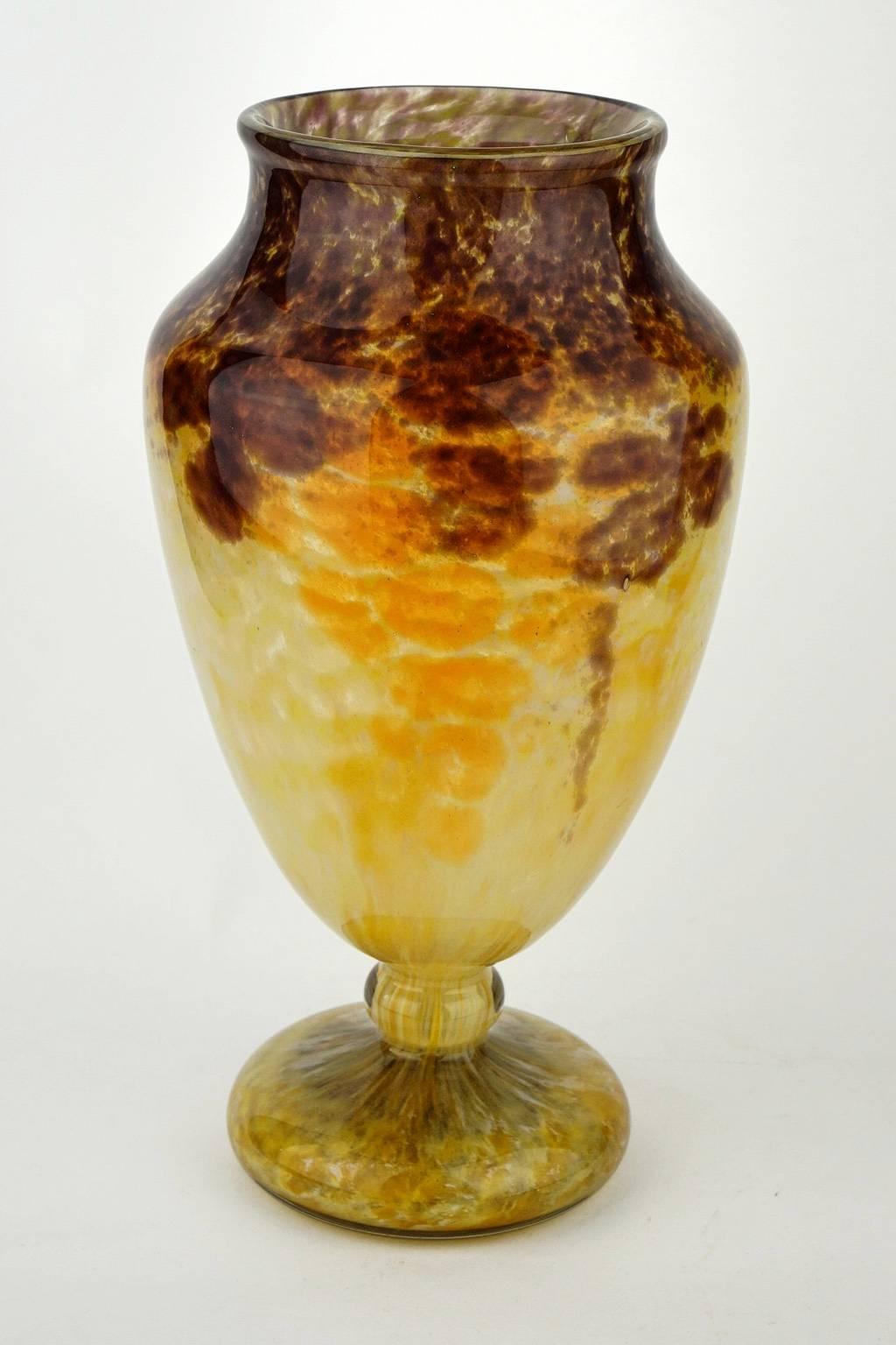 Large French Art Deco Jade vase in brown, yellow and cloudy white hues with stylized patterns of bunches of grapes by Charles Schneider. Very good condition.

The Jade series played a major role in Charles Schneider's Art Deco production. From