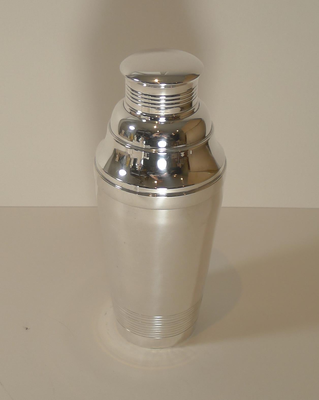 A superb large antique cocktail shaker in silver plate having been professionally cleaned and polished in our silversmith's workshop.

The underside is fully marked for Maison Pierre Bognon of 7 Rue Saint Sébastien, Paris who was only in operation