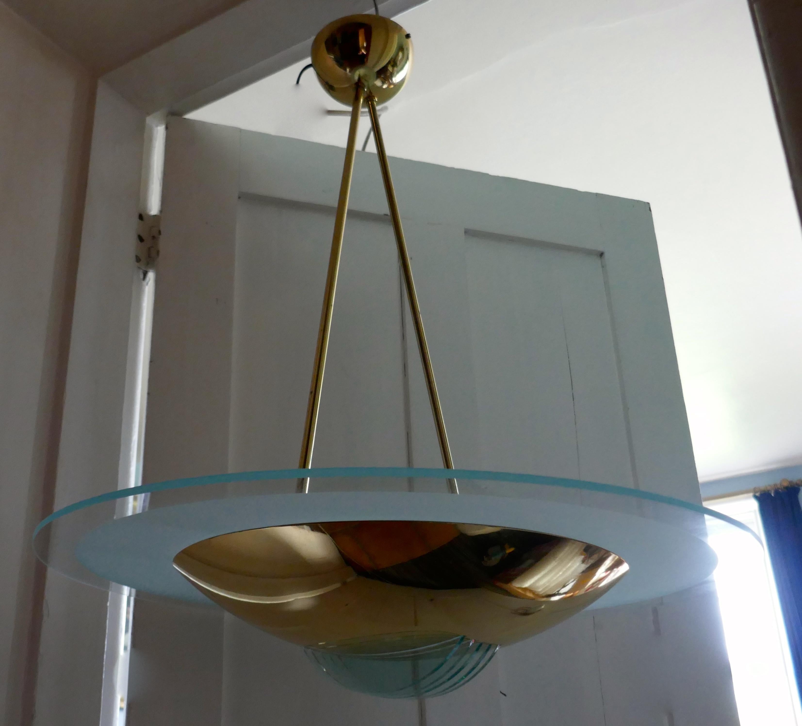 Large French Art Deco glass hanging pendant light


Beautiful and classic Art Deco design, this large light has a brass “A” frame supporting a heavy glass shade
When lit the edges of the glass shine green
The light is in very good condition,