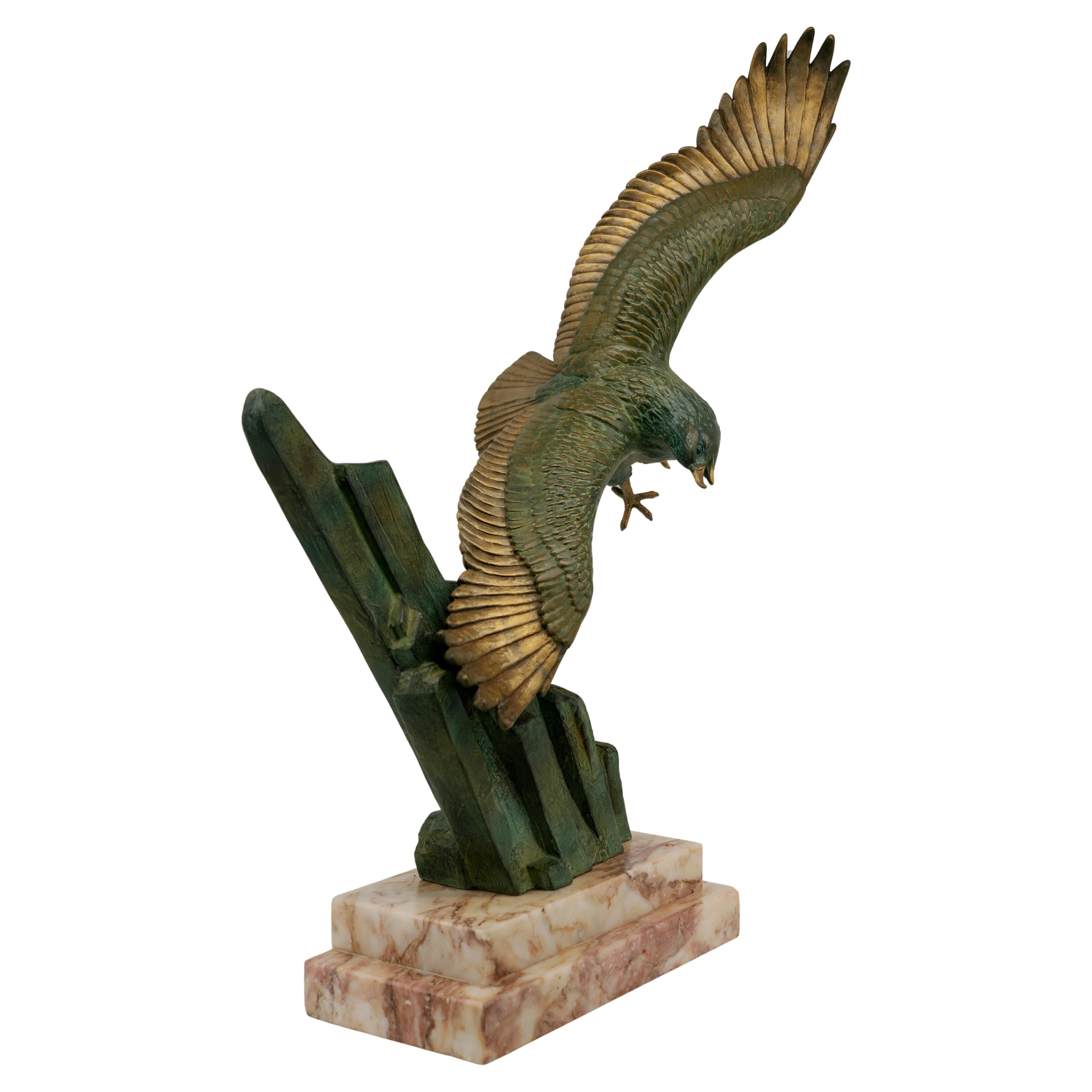 Large French Art Deco golden eagle sculpture by ROLAS, France, 1920s. Spelter and marble. Height : 27.4