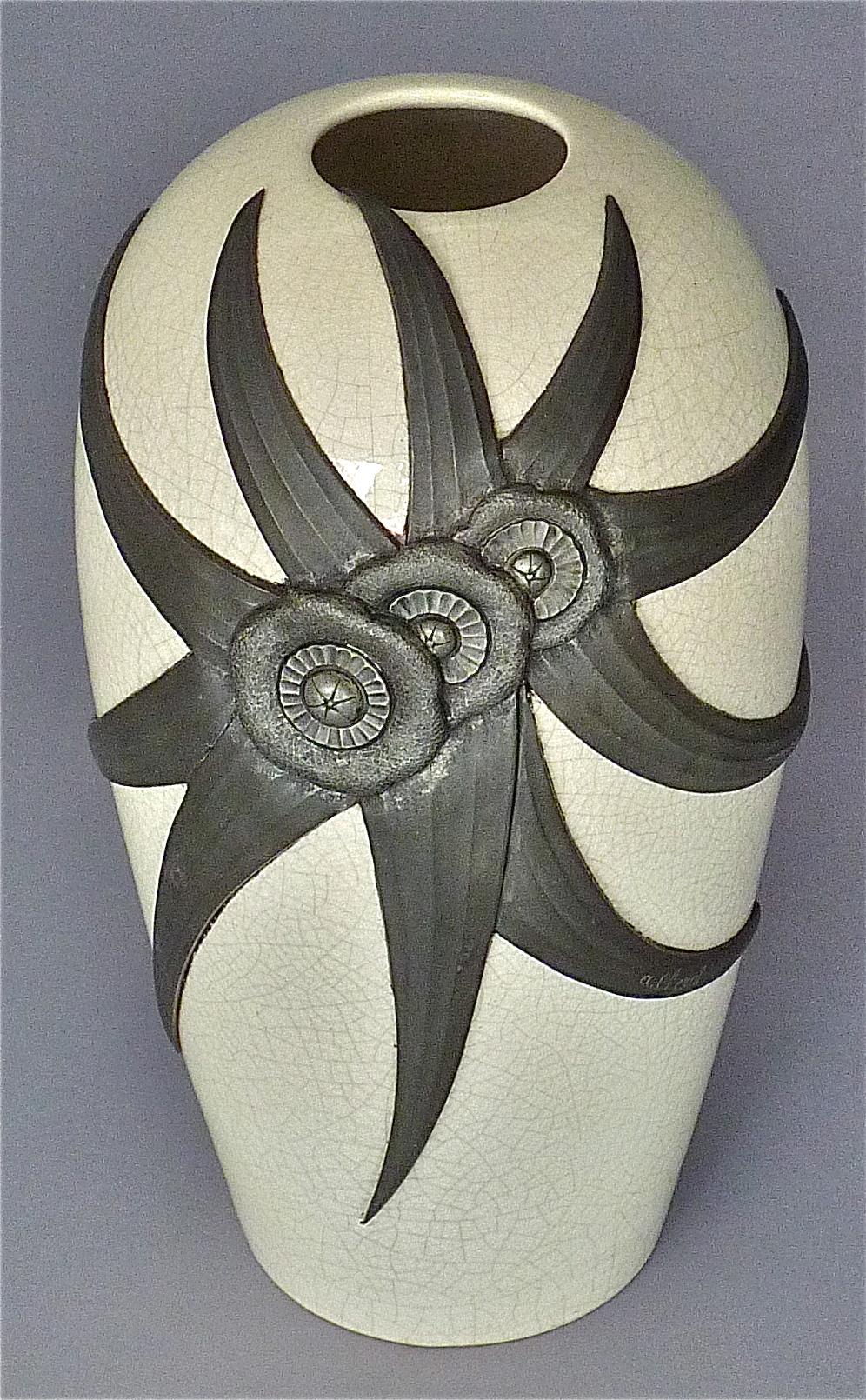 Exceptional large antique French Art Nouveau / Art Deco ceramic vase probably designed by Roger Guerin in cooperation with Albert Chezal, France around 1910-1930. The crackled glaze ceramic vase in ivory or off-white color has a beautiful large