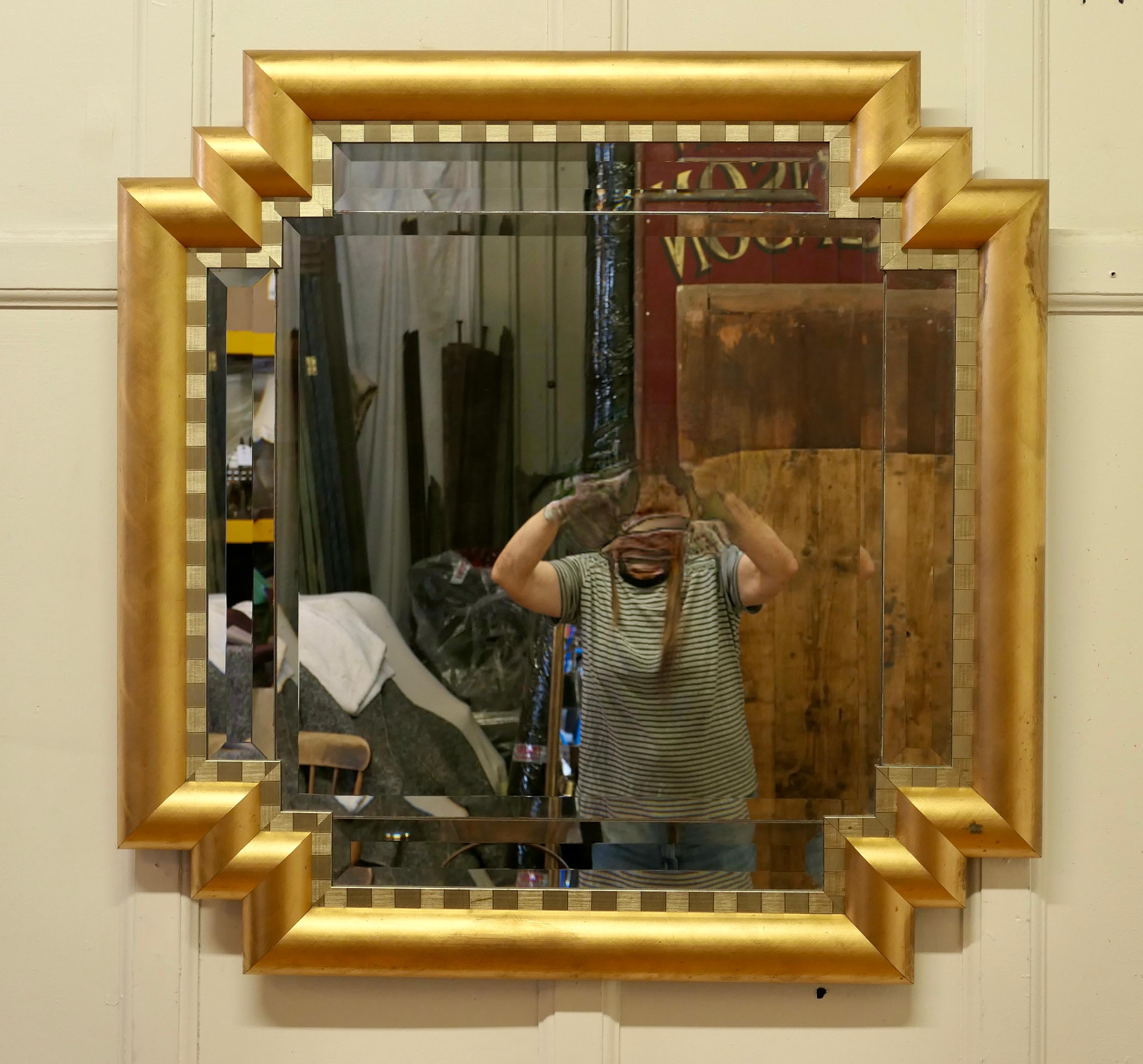 Early 20th Century Large French Art Deco Odeon Style Gilt Mirror    For Sale