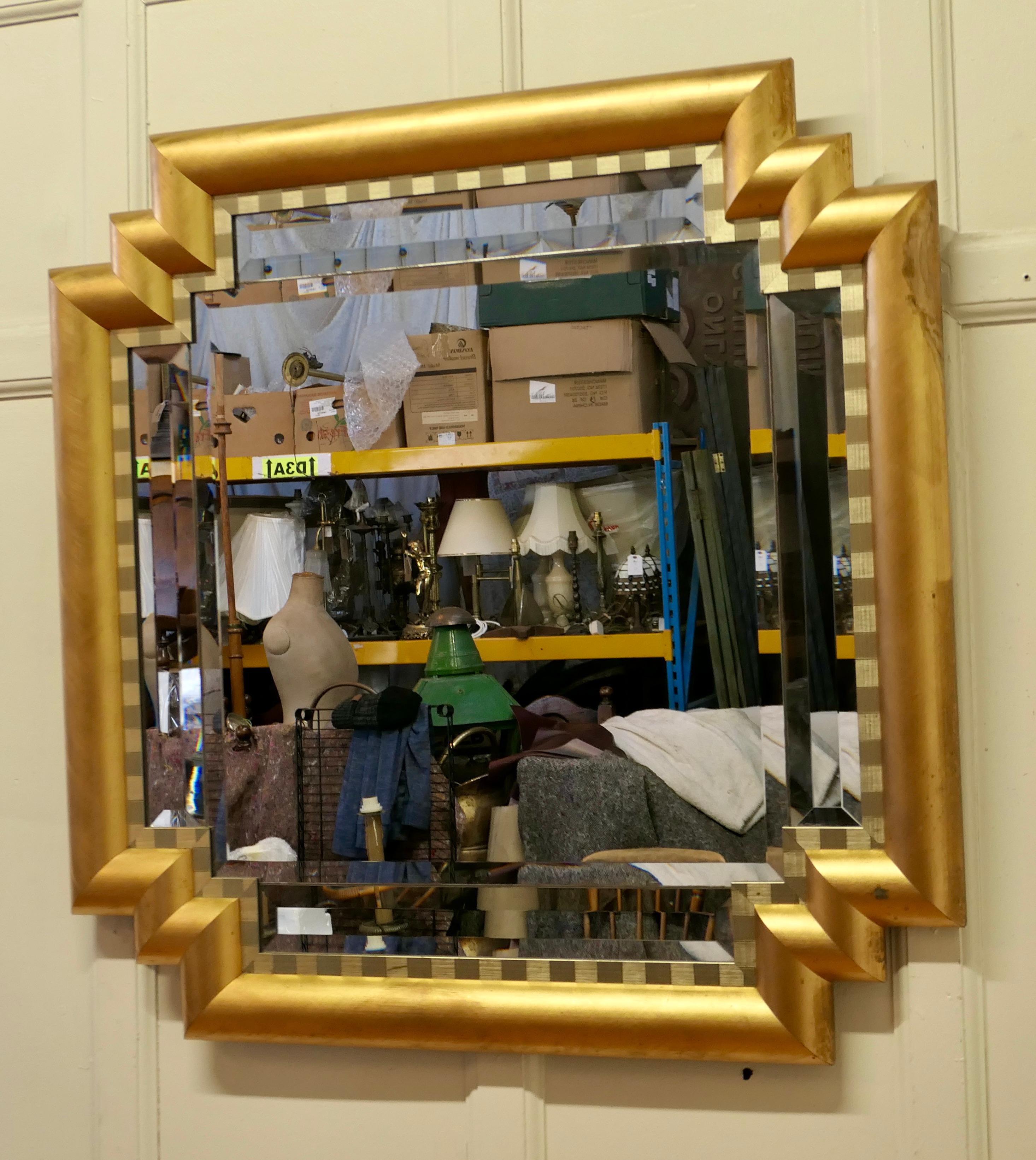 Giltwood Large French Art Deco Odeon Style Gilt Mirror    For Sale