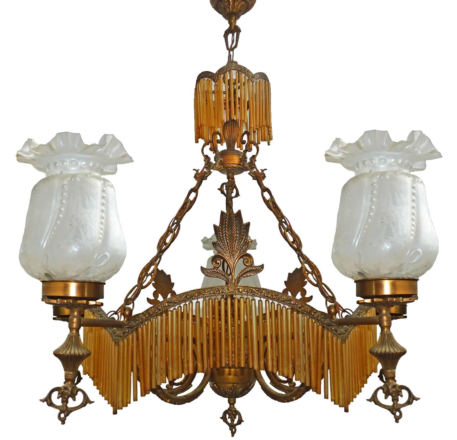Gorgeous antique French chandelier in amber glass tubes, Art Deco / Art Nouveau 
Measures: 
Diameter 36 in / 90 cm
Height 40 in / 100 cm 
Glass shades: 6.3 in (16 cm) / 8.3 in (21 cm)
Five light bulbs E 14/ good working condition.
Weight: 30 lb. (14