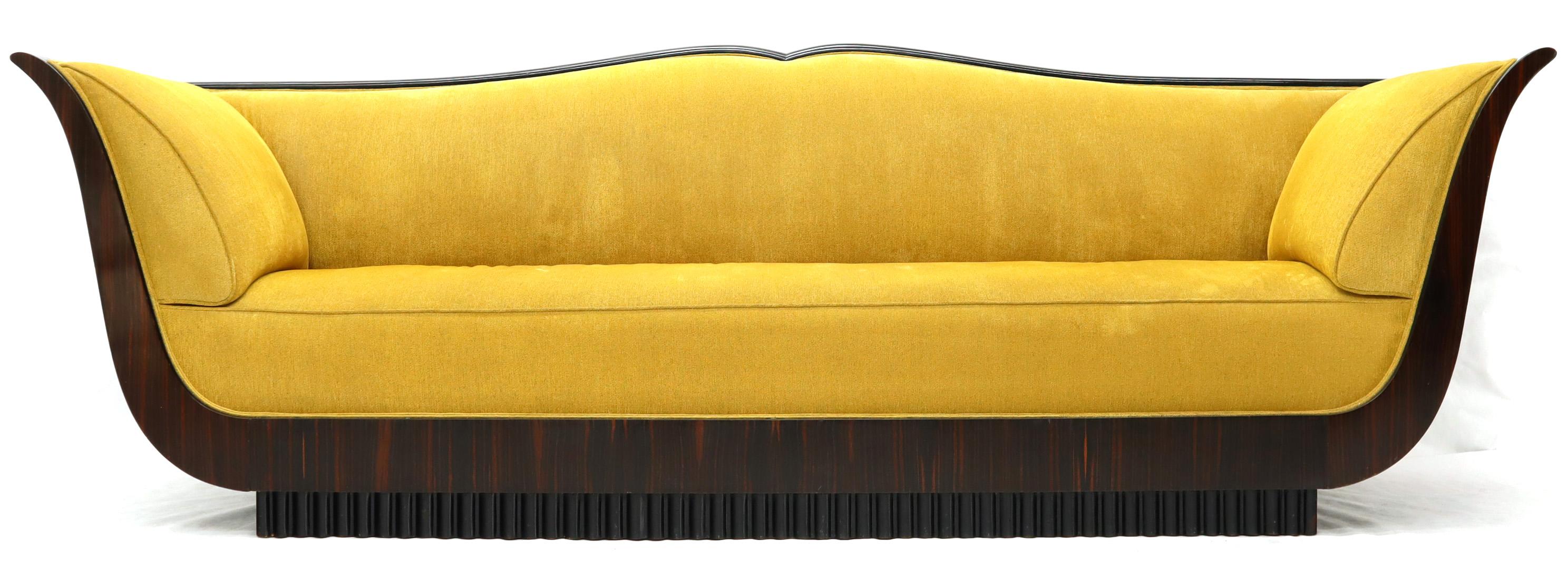 Large French Art Deco gold velvet upholstery grand sofa.
Rare find excellent original condition.
