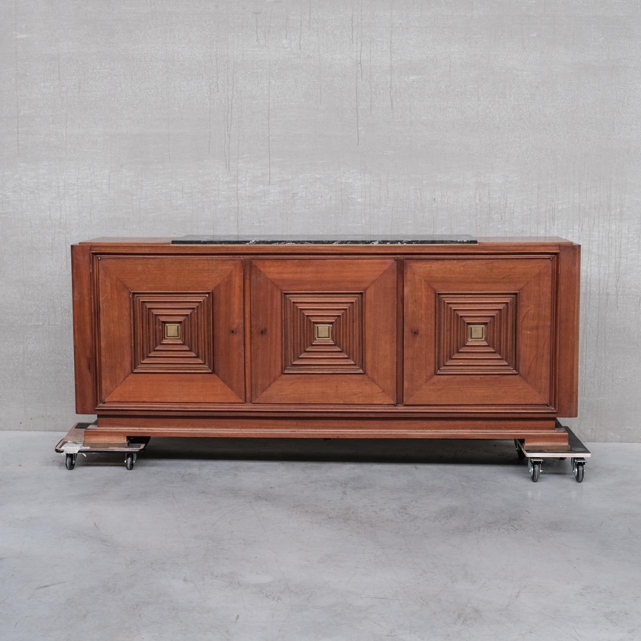 A large sideboard or credenza in the manner of Maxime Old. 

France, c1940s. 

Original marble top retained but it has a large crack running through it, the price include replacement of the marble with a suitable replacement, either white or black