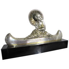 Large French Art Deco Silver and Parcel Gilt Bronze Woman in Canoe, M.L Simard