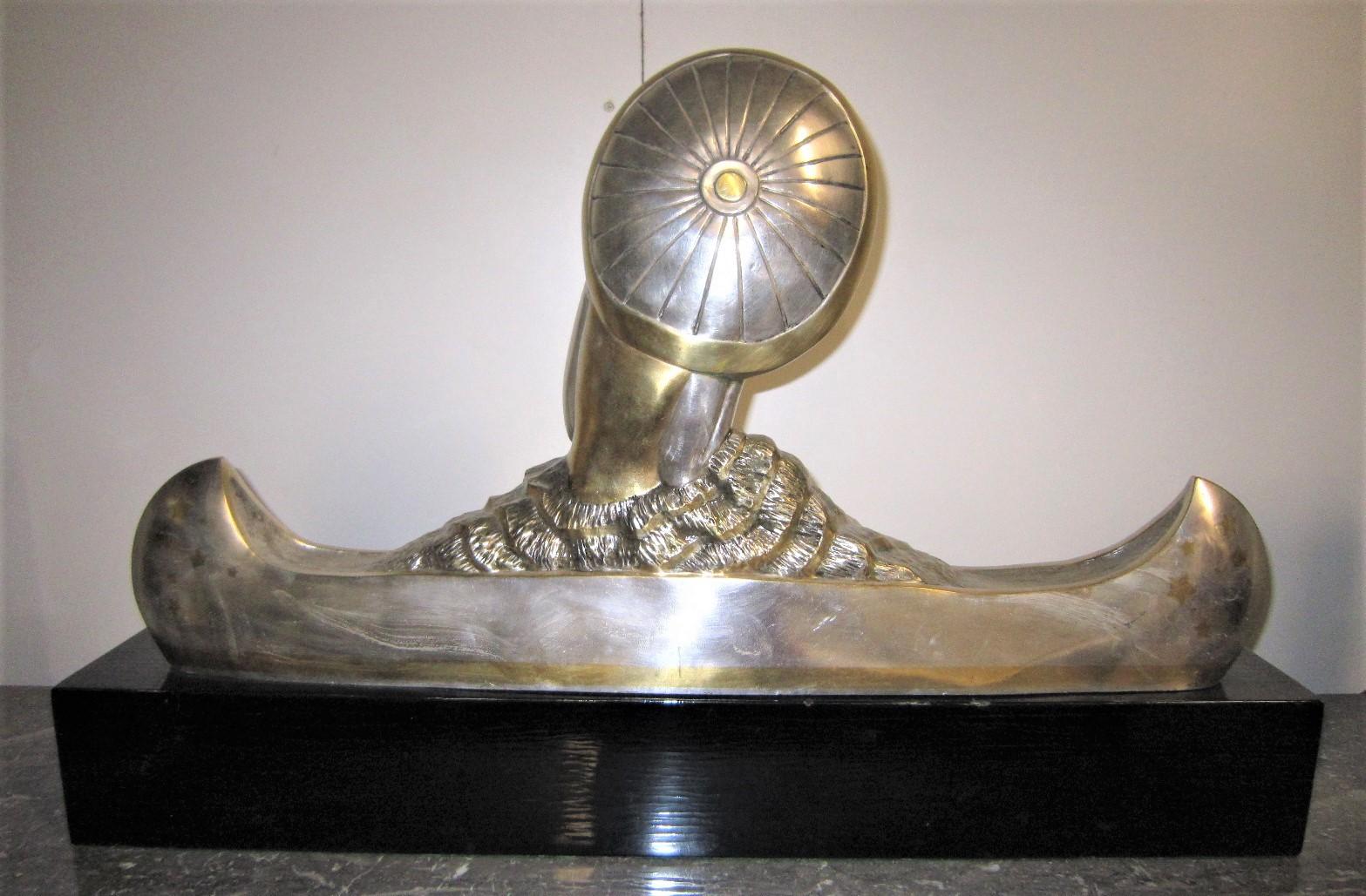 Français Grande femme en canoë Art Déco en argent et bronze doré à la feuille, M.L Simard en vente