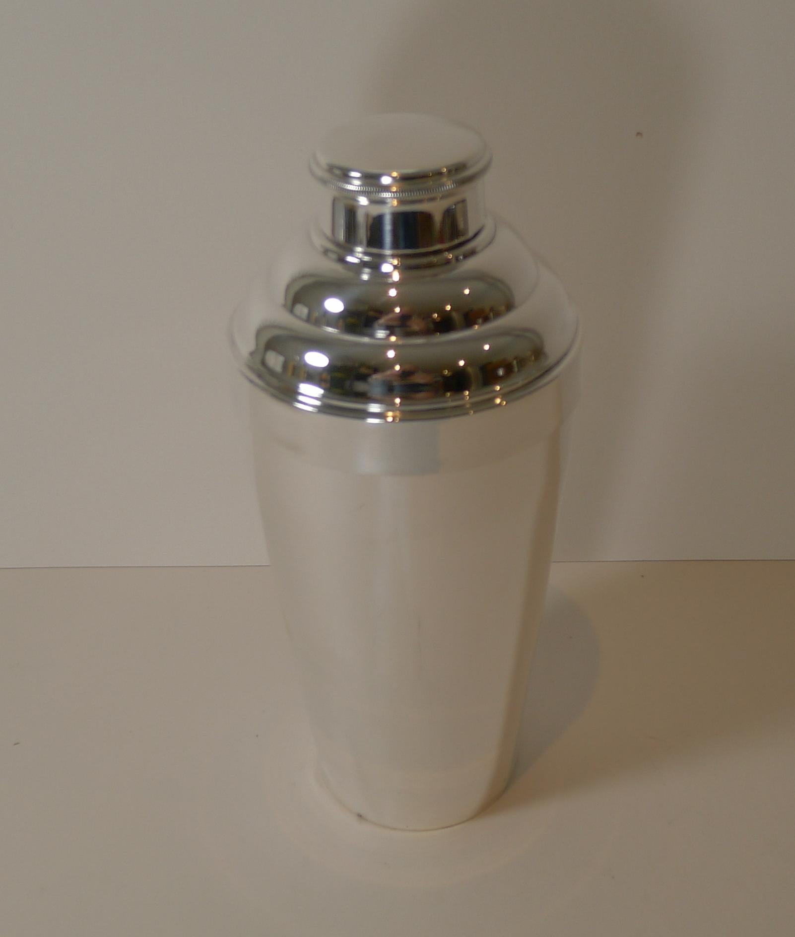 A handsome large silver plated cocktail shaker, French in origin, fully marked on the underside as the per the photographs. Art Deco in era dating to the 1930's.

Just back from our silversmith's workshop where it has been professionally cleaned