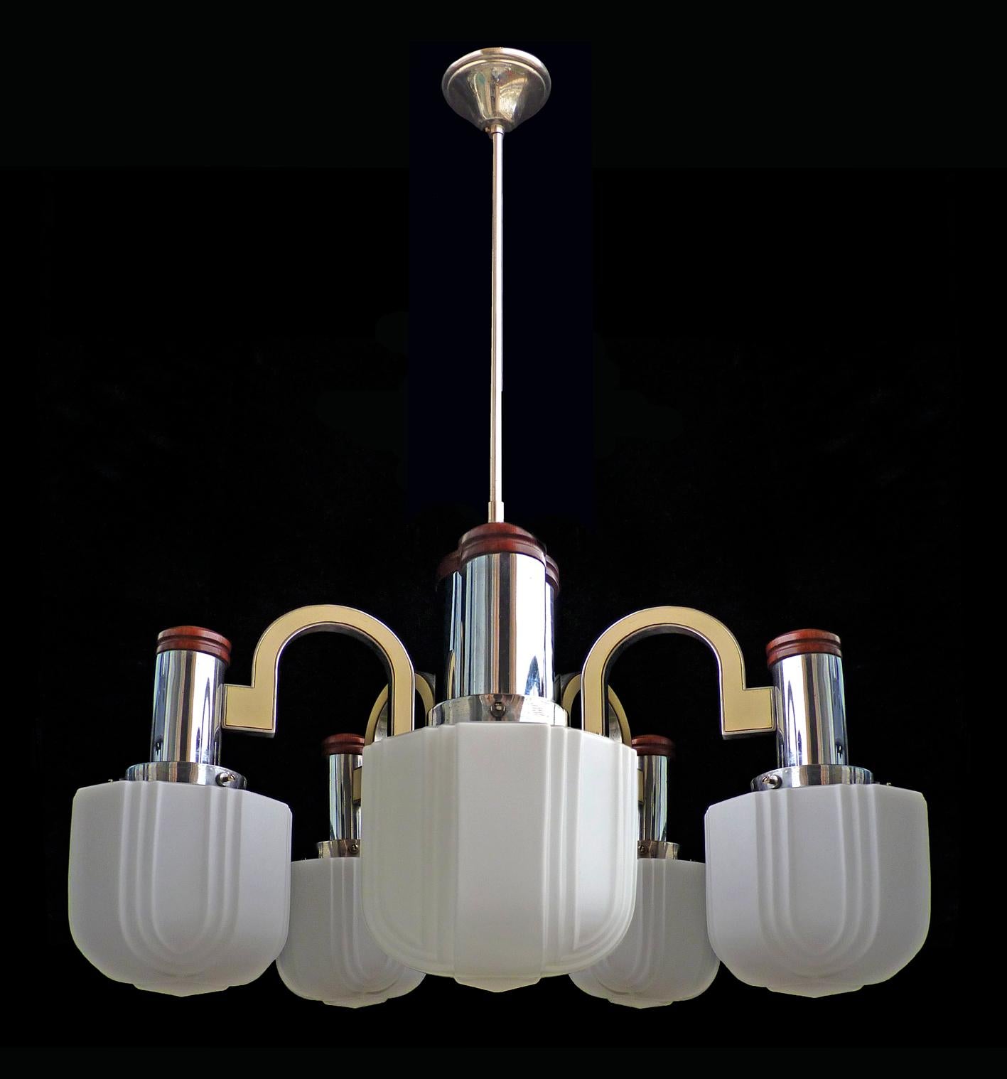 Fabulous vintage French Art Deco Opaline skyscraper glass shades 5-light chrome chandelier
Measures: 
Diameter 27.5 in/ 70 cm
Height: 37.5 in/ 95 cm
Weight: 24 lb/ 11 Kg
5 cased glass shades/chromed brass (16 cm/ 6 in)
5 light bulbs E14/ Good