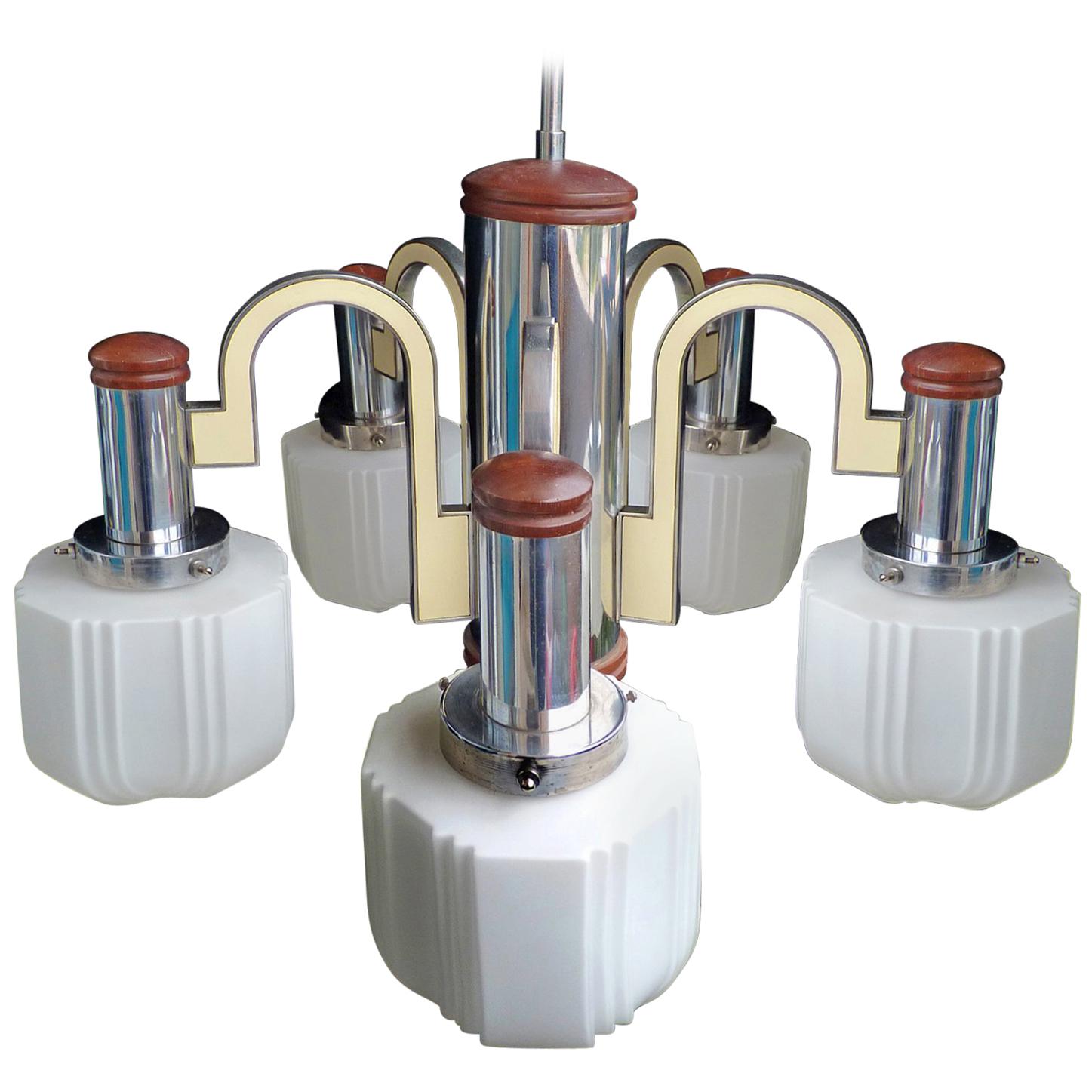 Fabulous vintage French Art Deco Opaline skyscraper glass shades 5-light chrome chandelier
Measures: 
Diameter 27.5 in/ 70 cm
Height: 37.5 in/ 95 cm
Weight: 24 lb/ 11 Kg
5 cased glass shades/chromed brass (16 cm/ 6 in)
5 light bulbs E14/ Good