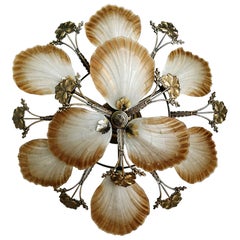 Gran araña francesa Art Nouveau Hollywood Regency de latón dorado con cristal de bronce
