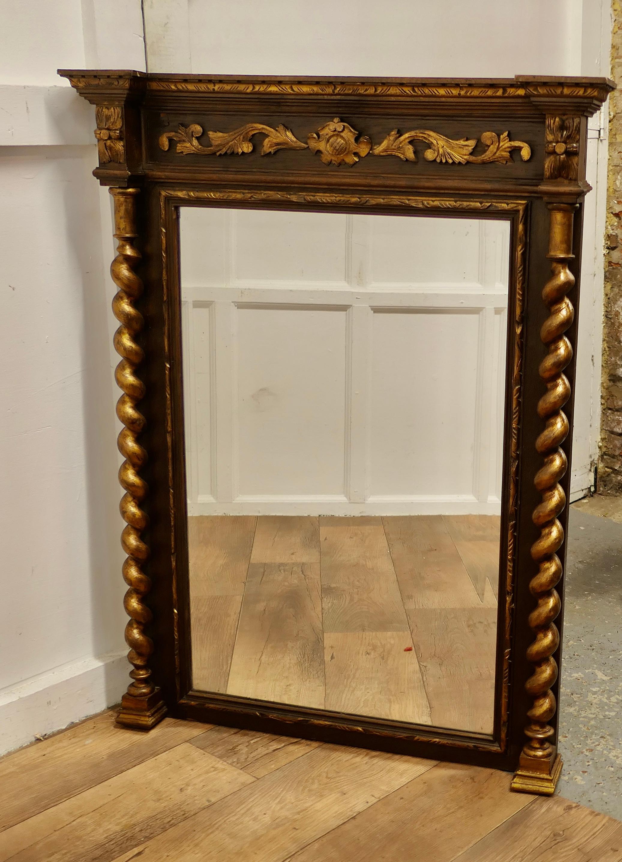 Large French Barley Twist Oak Wall Mirror

The Oak Mirror Frame is attractively carved along the top edge with acanthus leaves and attractive mouldings, it has a large Cornice and barley twist columns at each side, the carved decoration is