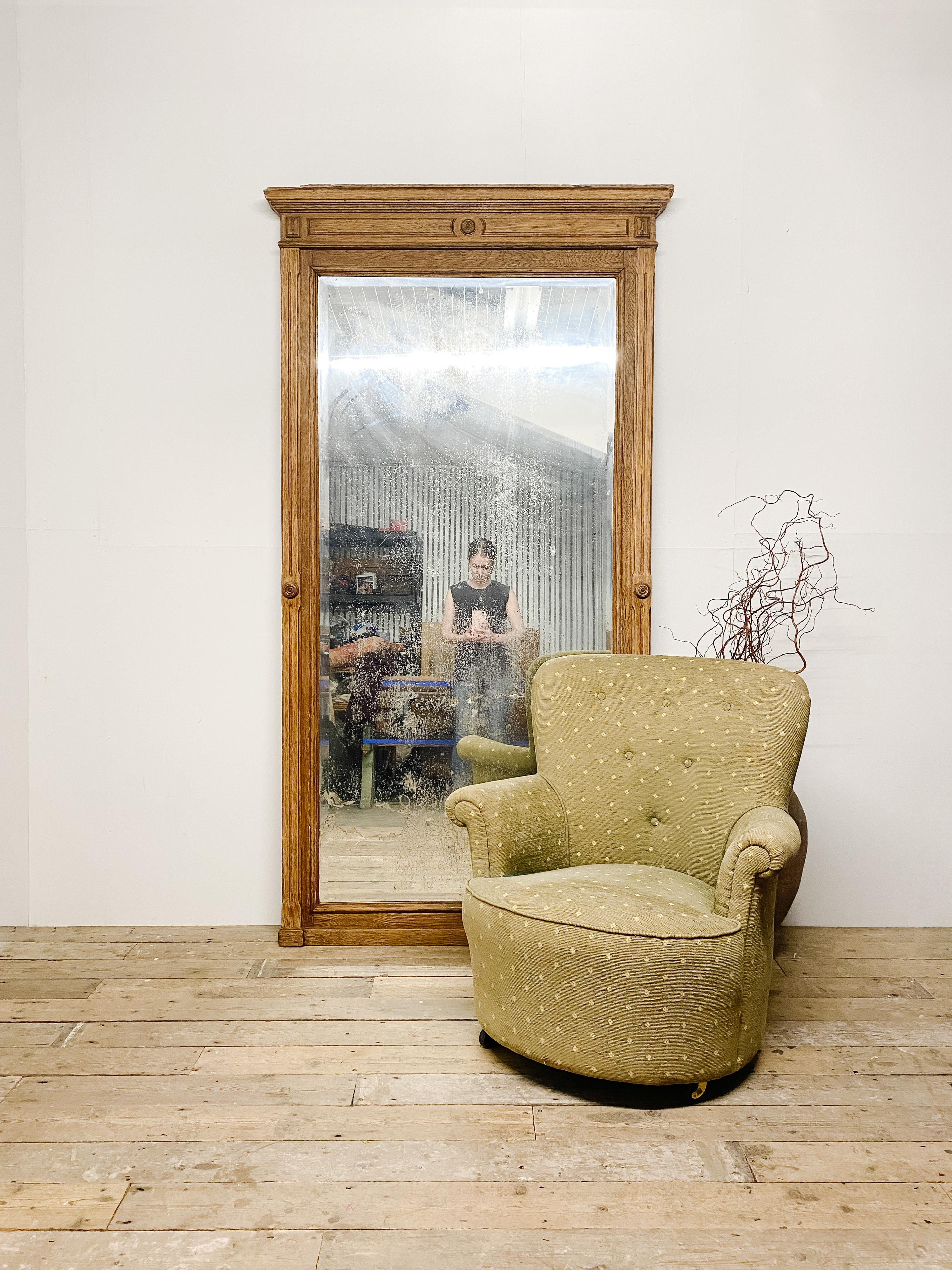 This is large, beautiful French bleach oak effect mirror that will make a grand statement in any home. Substantial size and very heavy with stunning foxing and distressing to the mirror plate. Some damage to the frames cornice but this adds to the