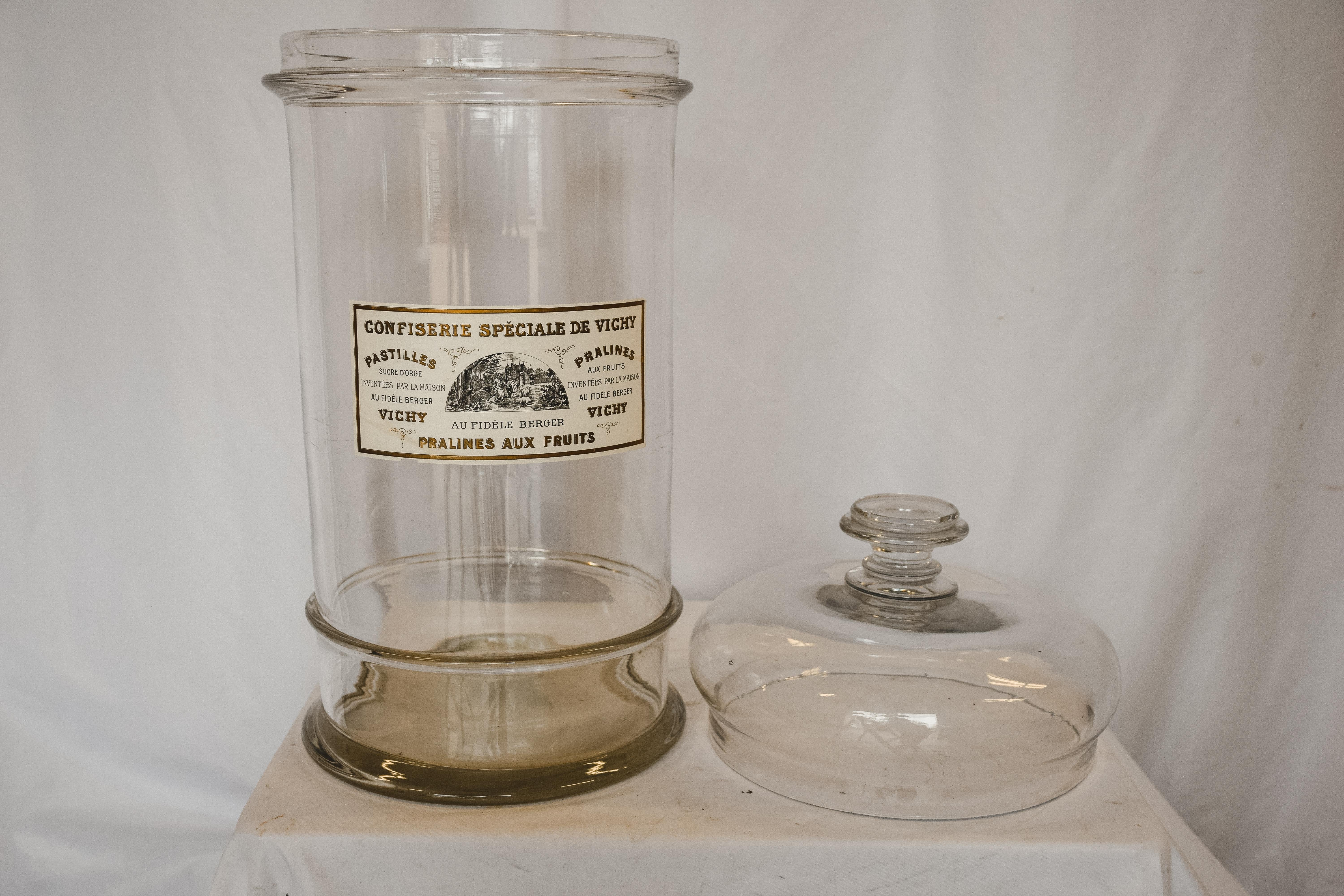 large glass canister with lid