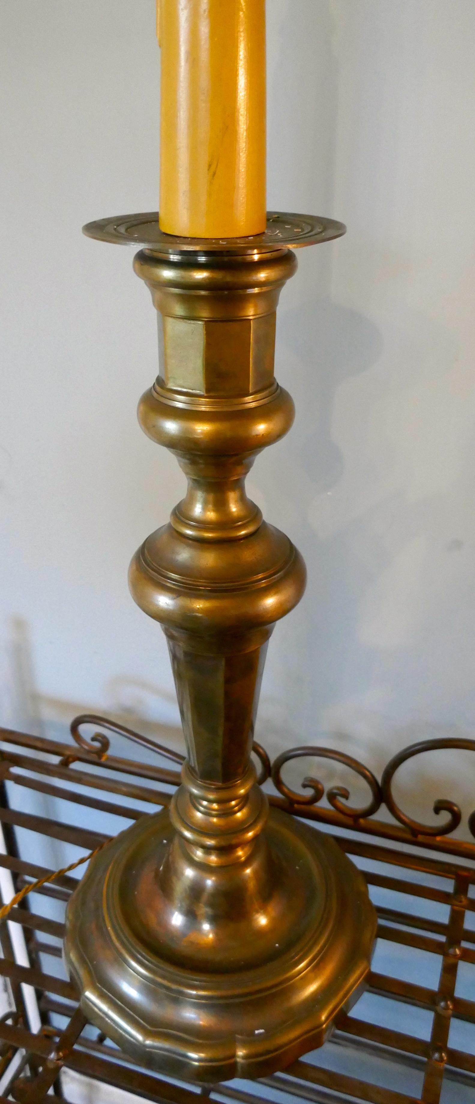 Large French brass candlestick table lamp.


This is a very good quality and very heavy piece, the lamp looks like a huge brass candlestick, even the candle tube at the top is larger than normal,


This is an attractive piece in working