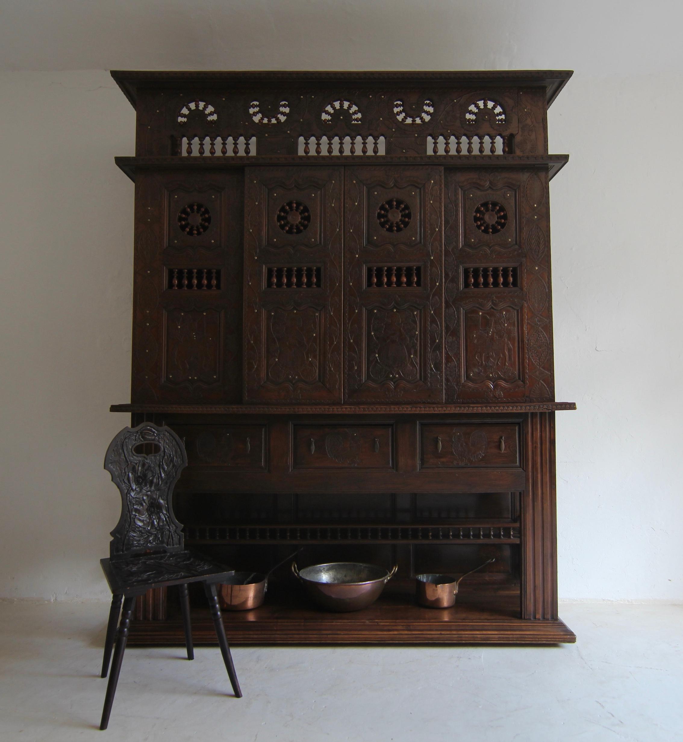 A large Breton cabinet, former ‘lit-clos’. Dated 1817, rebuilt at the end of the 19th/beginning of the 20th century. Made from solid oak. 

This extraordinary piece of furniture was originally a Breton lit-clos - a traditional built-in country house