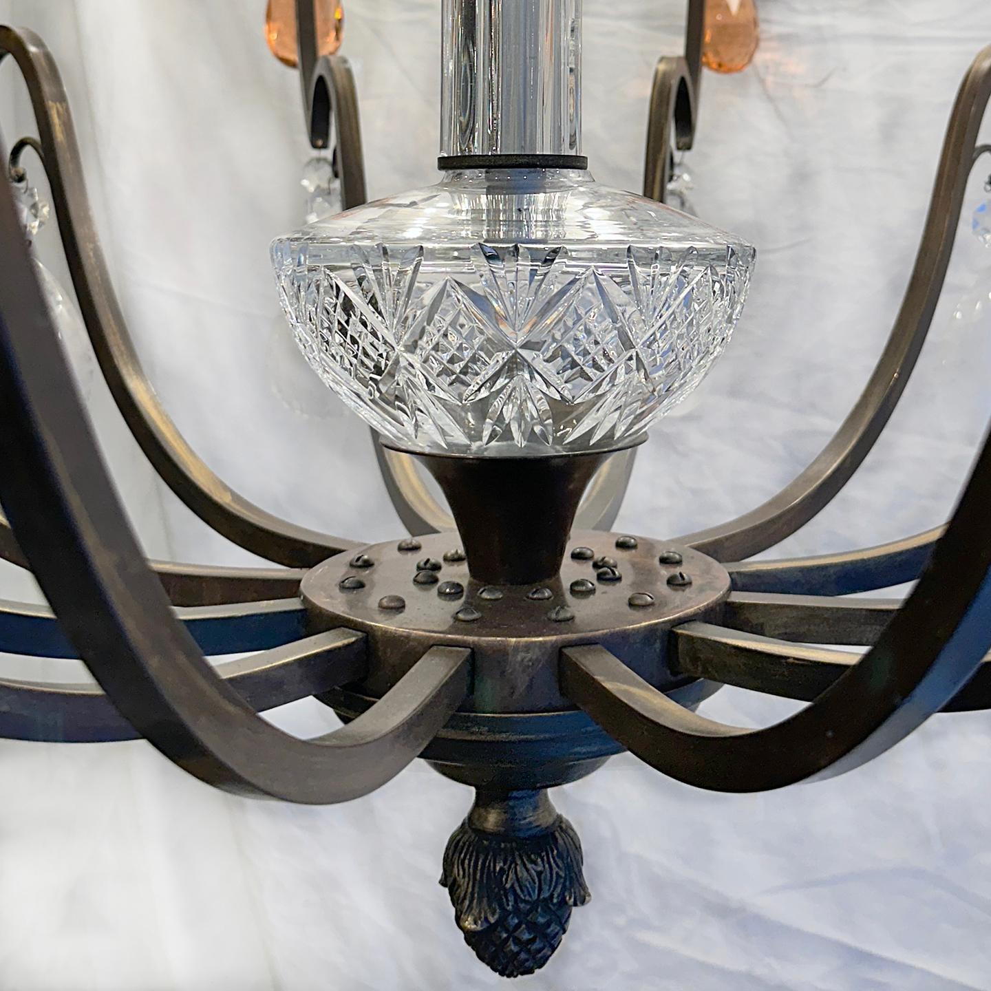 A large circa 1940's French chandelier with 12 lights and rock crystal pendants.

Measurements:
Minimum drop: 64