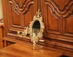 Large French Bronze Four-Light Sconce with Oval Centre Mirror and Cherub Decor