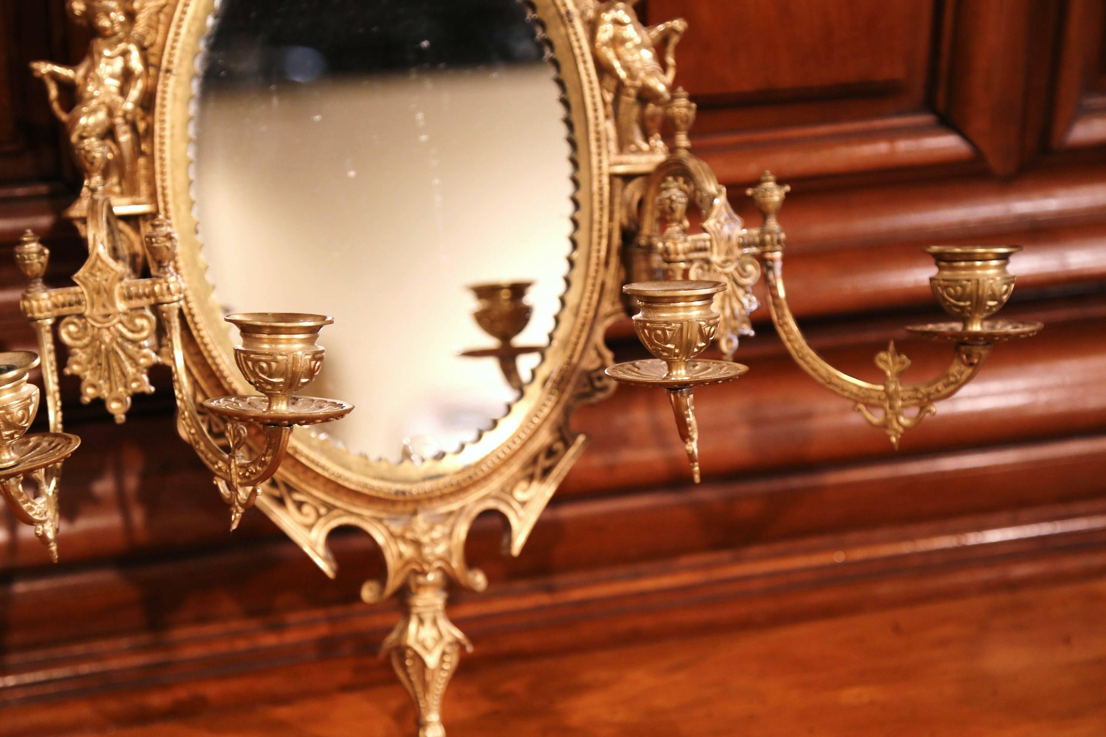 Gilt Large French Bronze Four-Light Sconce with Oval Centre Mirror and Cherub Decor