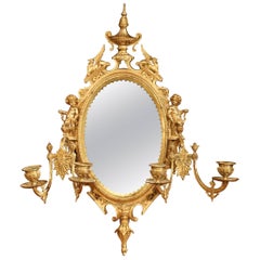 Large French Bronze Four-Light Sconce with Oval Centre Mirror and Cherub Decor