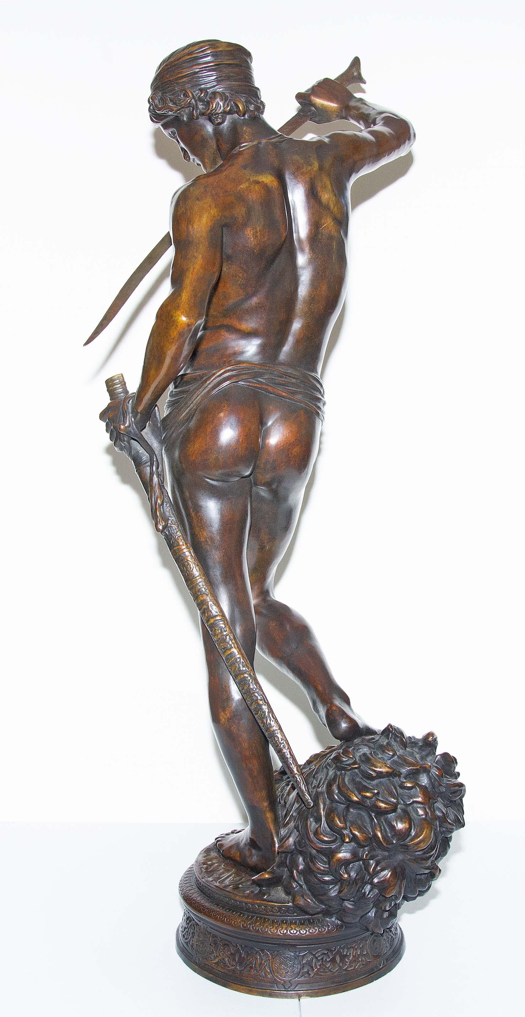 Fine French orientalist bronze statue of David after the battle with Goliath by Antonin Mercie. This subject received the Medal of Honour when it was shown at the Paris Salon des Beaux Arts. Late 19th century. 42