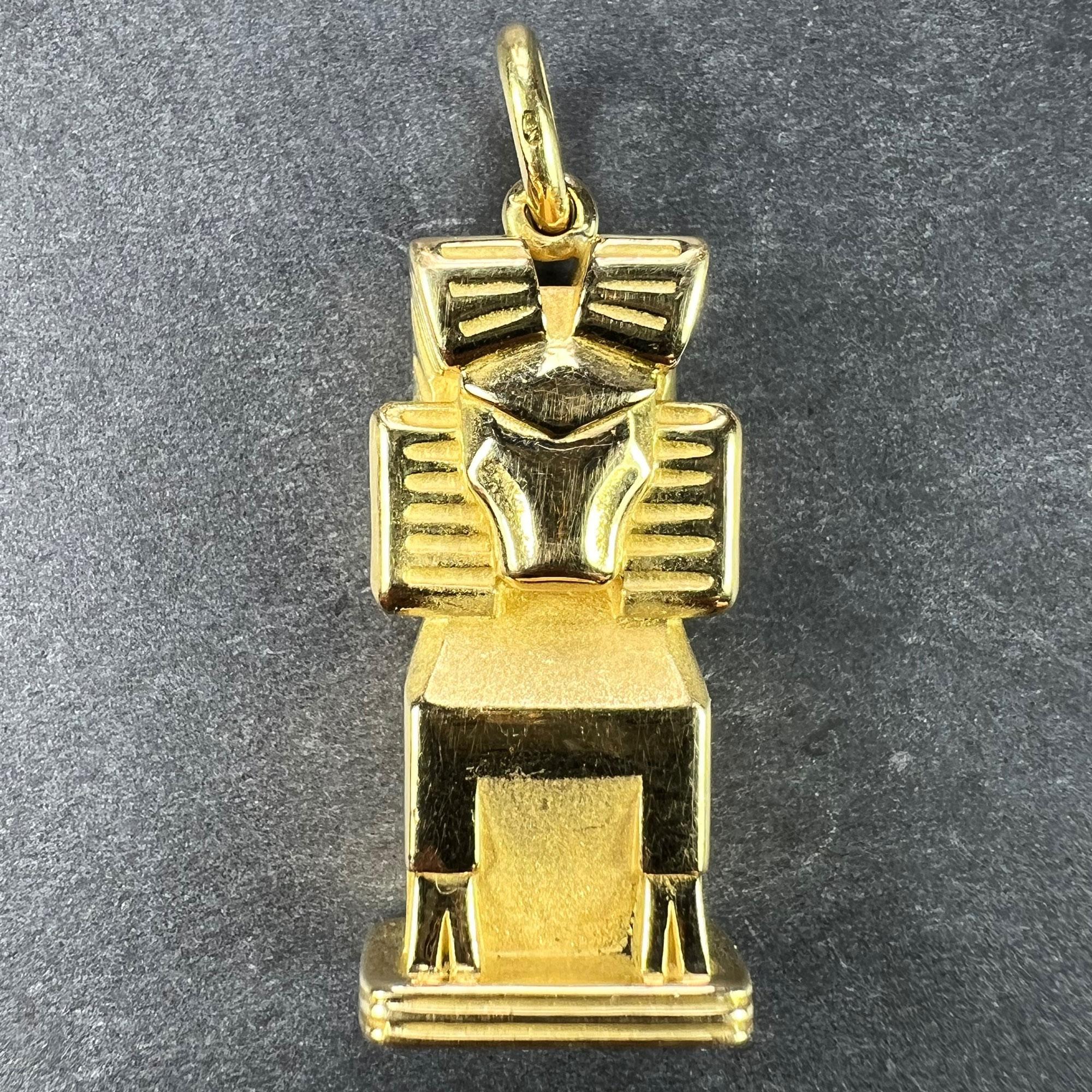A large French 18 karat (18K) yellow gold pendant depicting a three-dimensional goat representing the Zodiac star sign of Capricorn. Partially stamped with the eagle’s head for French manufacture and 18 karat gold.

Dimensions: 3.1 x 1.4 x 0.81 cm