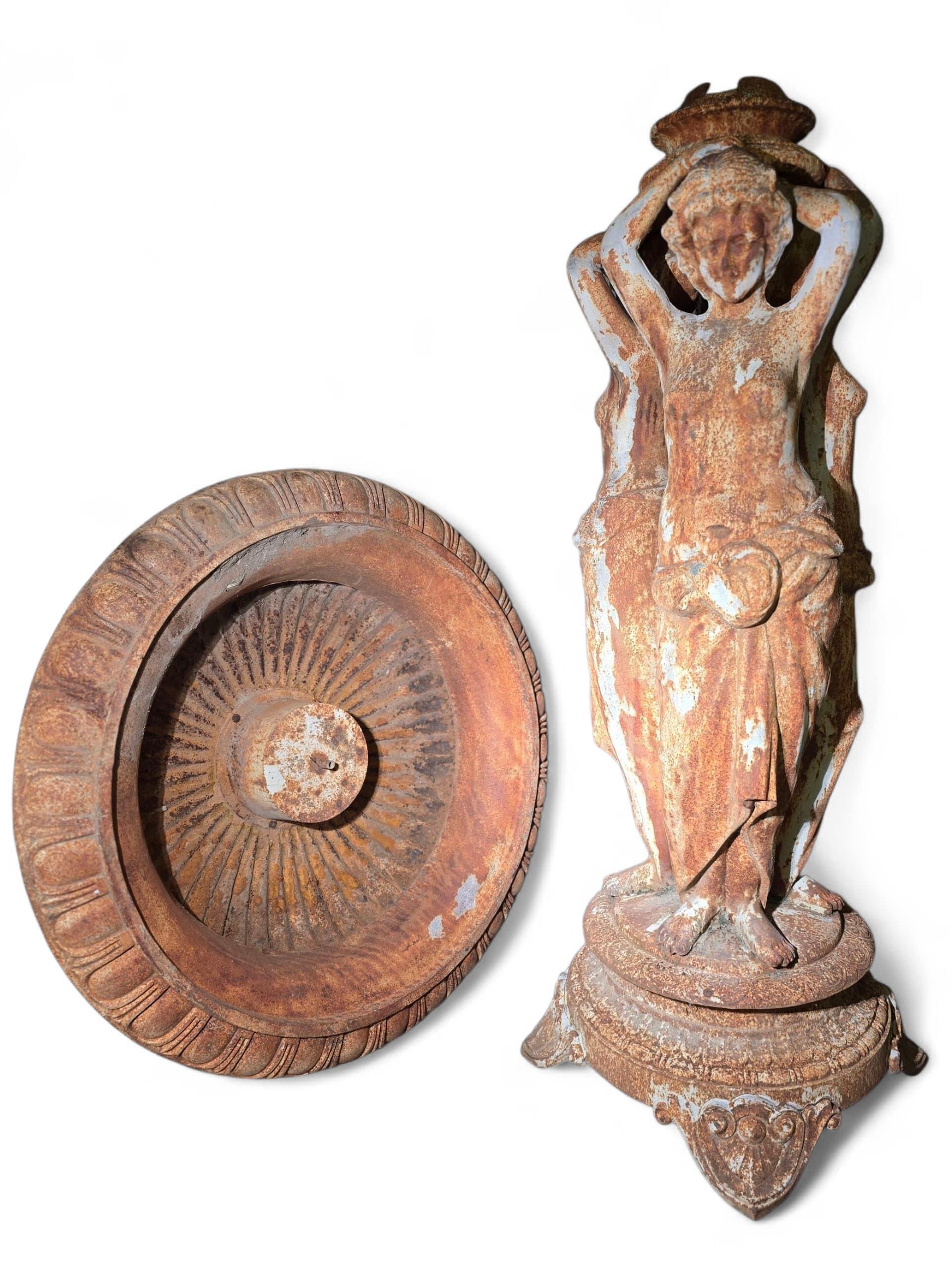 Impressive large cast iron garden fountain from the 1970s, featuring at its center the classical figures of The Three Graces, gracefully supporting a large domed basin.
A fine example of French craftsmanship, this fountain combines elegance, scale,