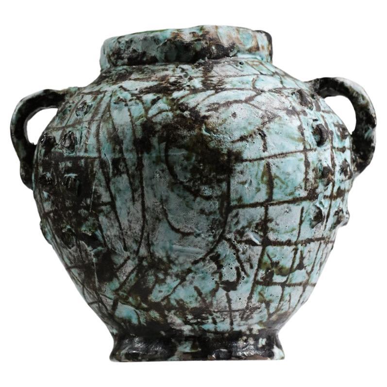 Bella ceramica degli anni '60 dell'artista Jérôme Massier realizzata a Vallauris. Smaltatura nei colori blu e marrone con il disegno di un uccello su un lato che ricorda lo stile di Picasso dell'epoca. Ceramica abbastanza massiccia, ottime