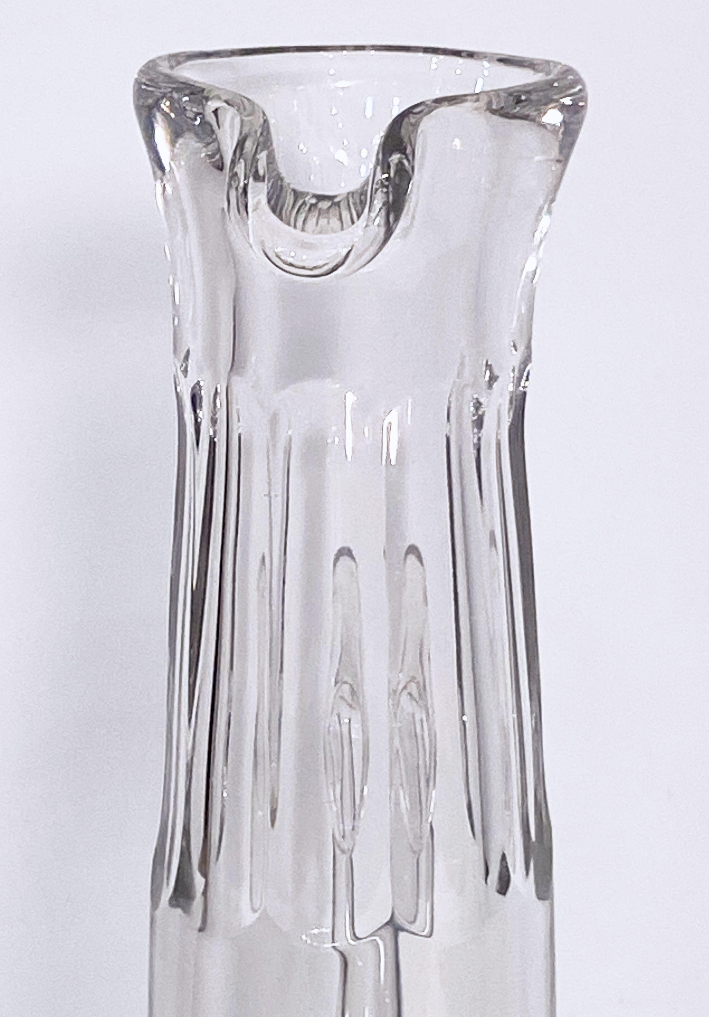 A fine vintage French champagne decanter of faceted crystal glass from the early 20th c., featuring a narrow neck designed to retain the bubbles.

The champagne decanter or jug hails from the mid 19th century when decanting champagne was