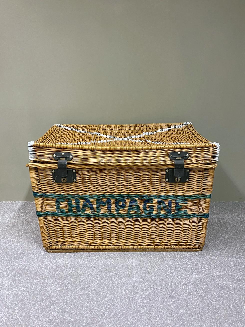 Early unique wicker trunk handmade in France in 1930s. The woven willow wicker trunk has a lid and two handles. The basket is in excellent condition with nice patina. It was used as a champagne bottle chest.
I found this beauty at an antique fair