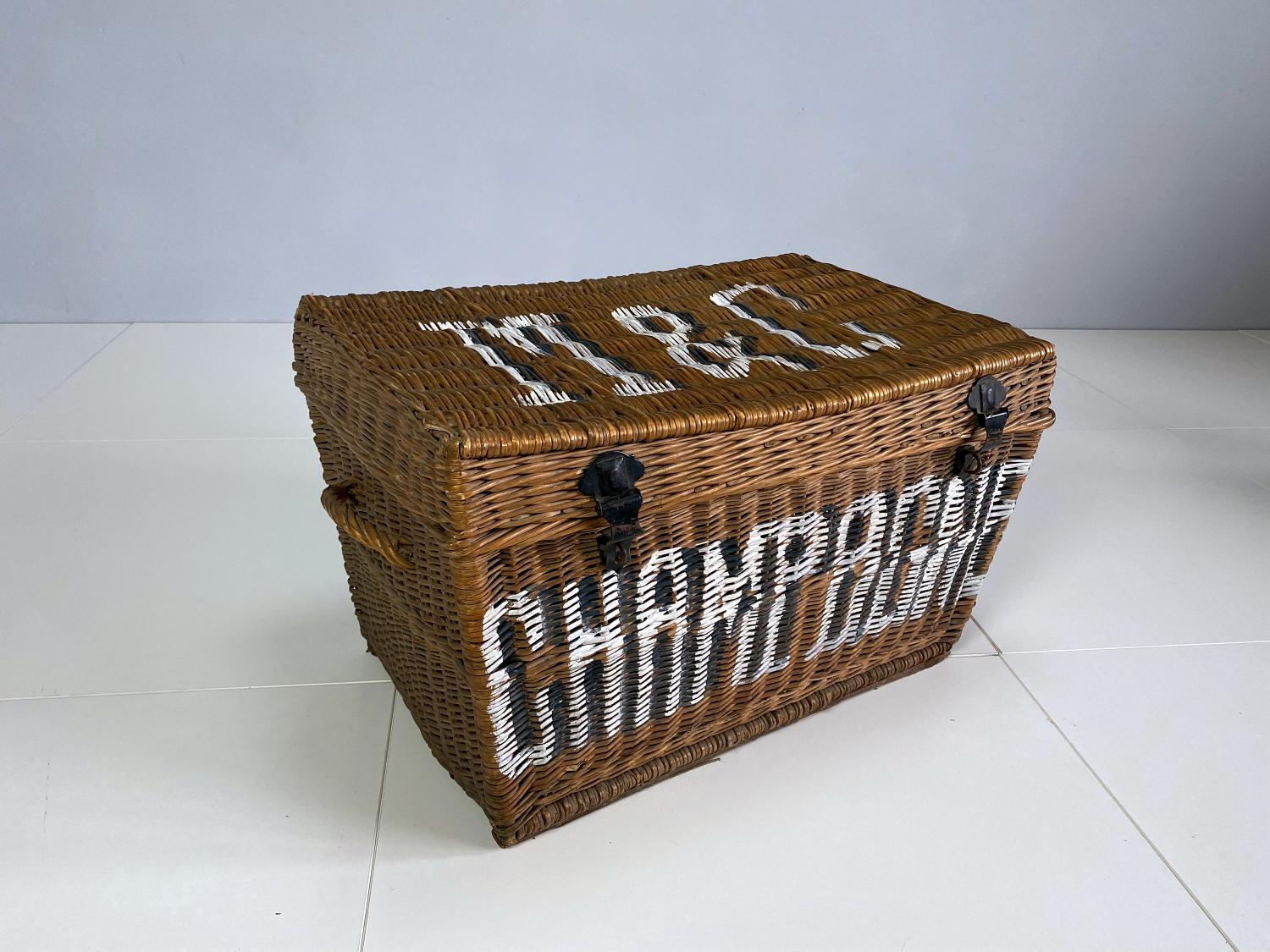 Early unique wicker trunk handmade in France in 1930s. The woven willow wicker trunk has a lid with two locks and two handles. The basket is in good condition with wormholes & nice patina. It was used as a champagne bottle chest.
We found this