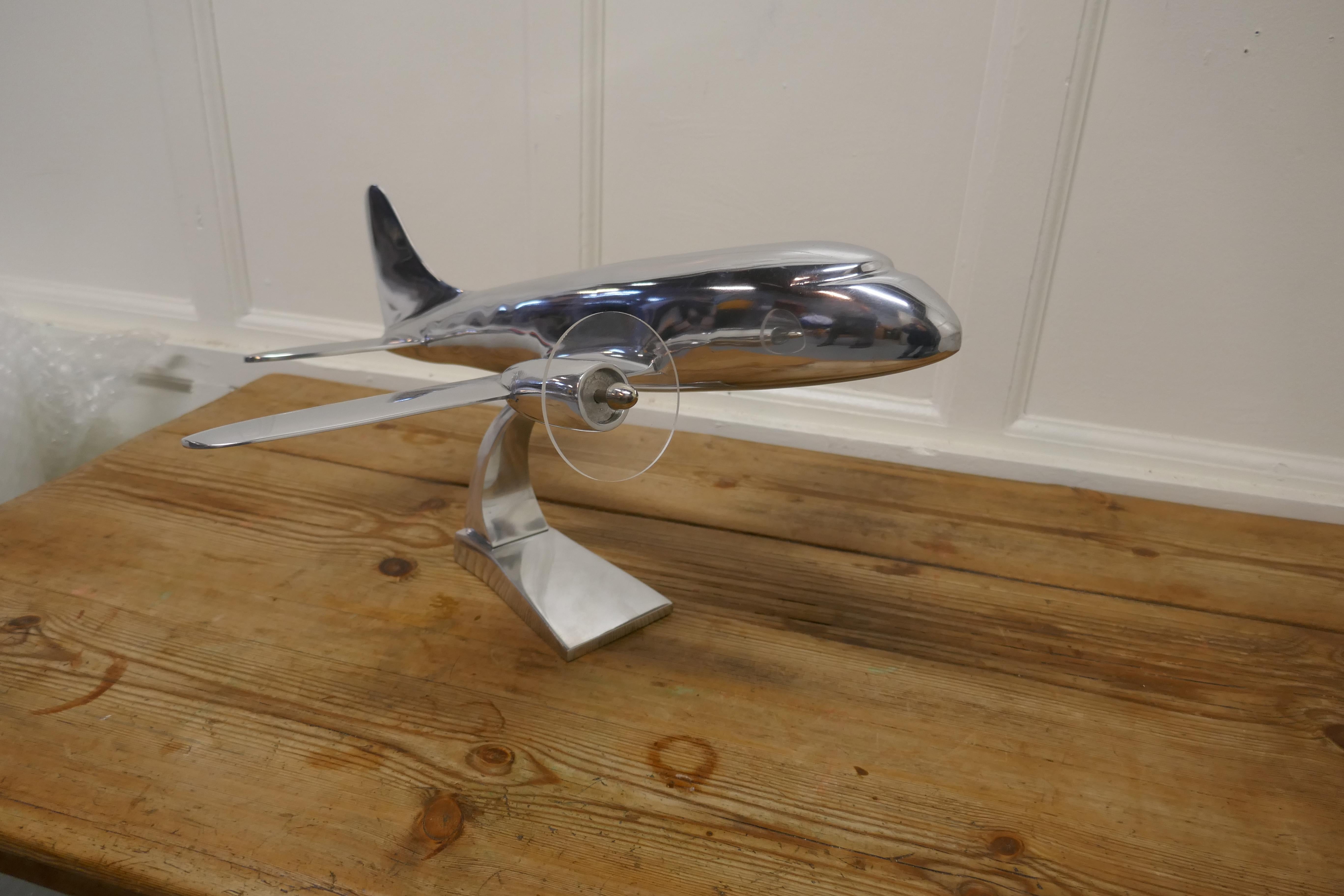 Large French chrome desktop model of Douglas DC3

A super piece and a great desk ornament for the desk that has everything else 
This model was displayed by BA travel agents, it is polished to a highly reflective stream line chrome finish, with