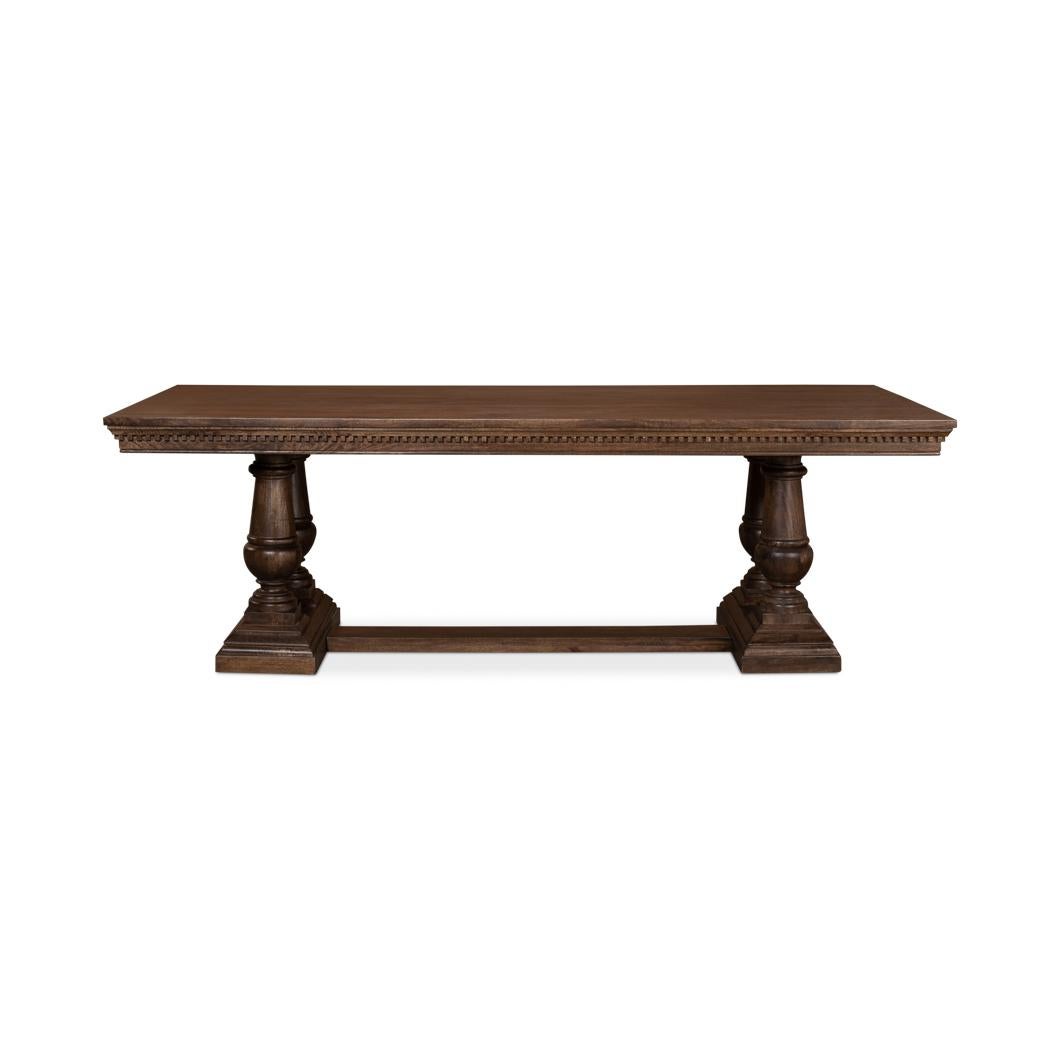 A true testament to classic elegance. This table's deep, rich hues and detailed woodwork speak of timeless luxury, while its robust double baluster trestle ends exude a sense of historic charm. The generously sized, rectangular top with its
