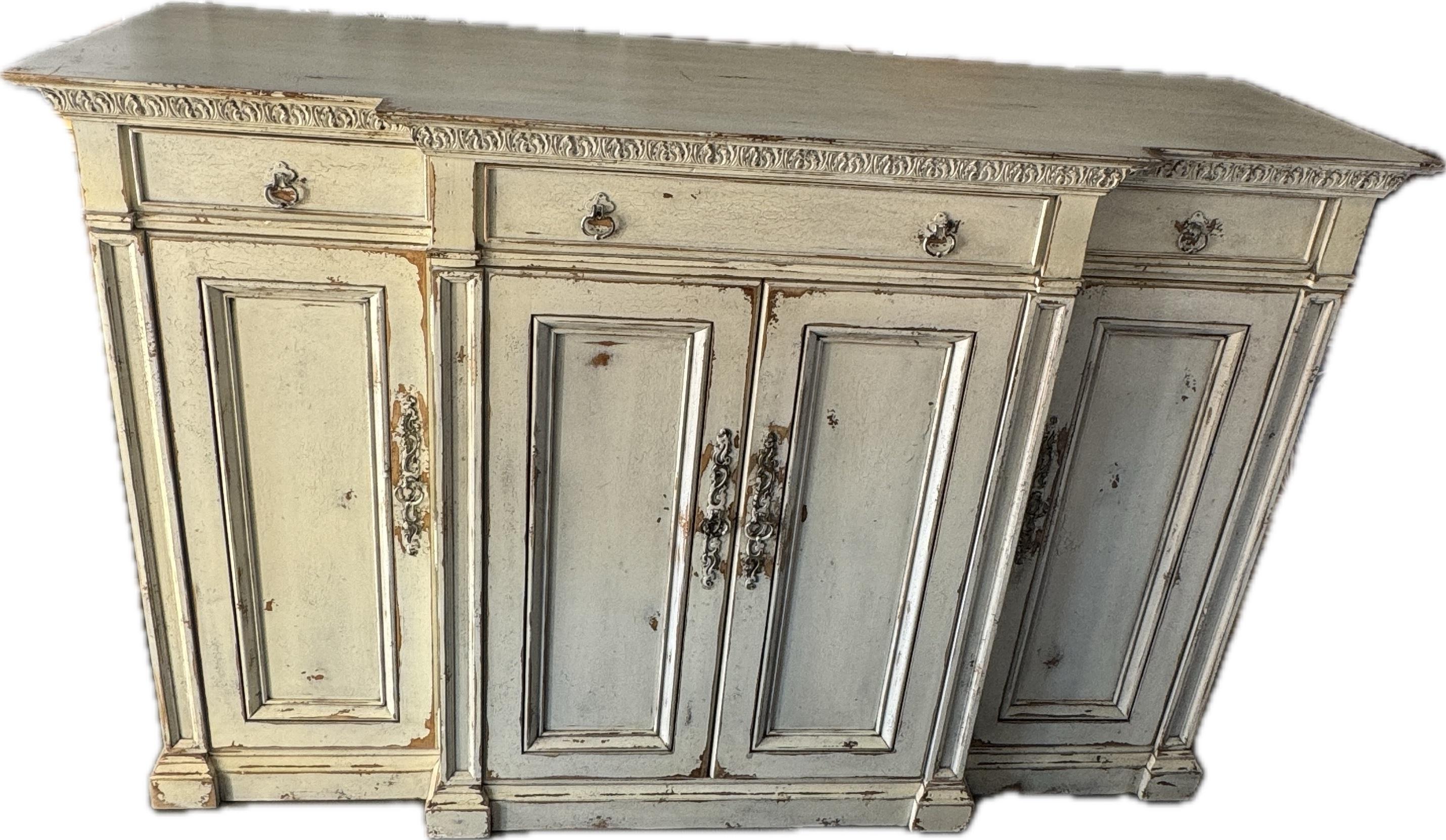 Large Habersham Painted Sideboard Cabinet with handcrafted trim along the top and carving on the cabinet pulls deliver an inviting and warm design with the intricate detailing throughout.
Habersham has been creating fine furniture and custom-fitted