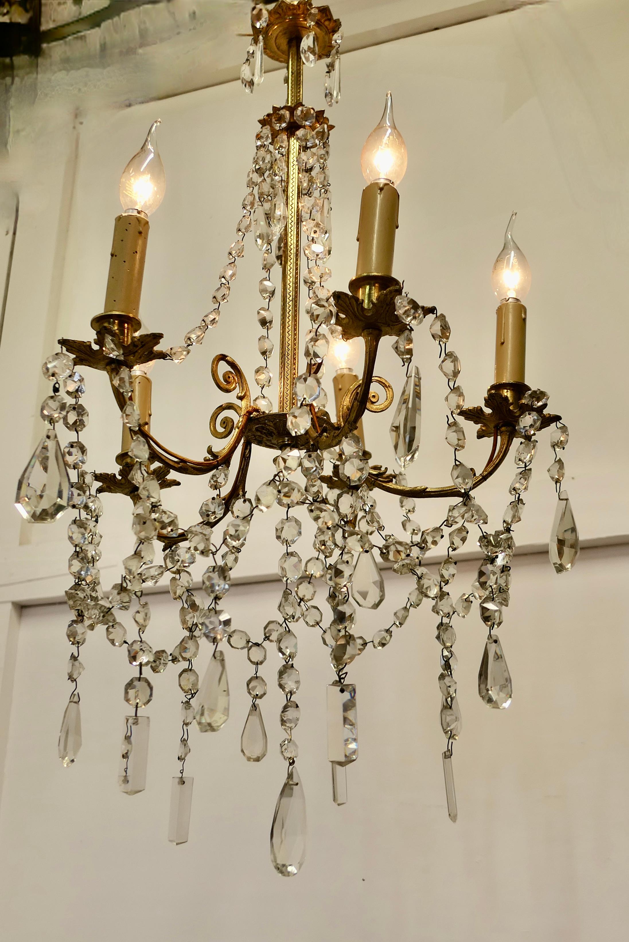 Early 20th Century Large French Crystal and Brass 5 Branch Chandelier    For Sale