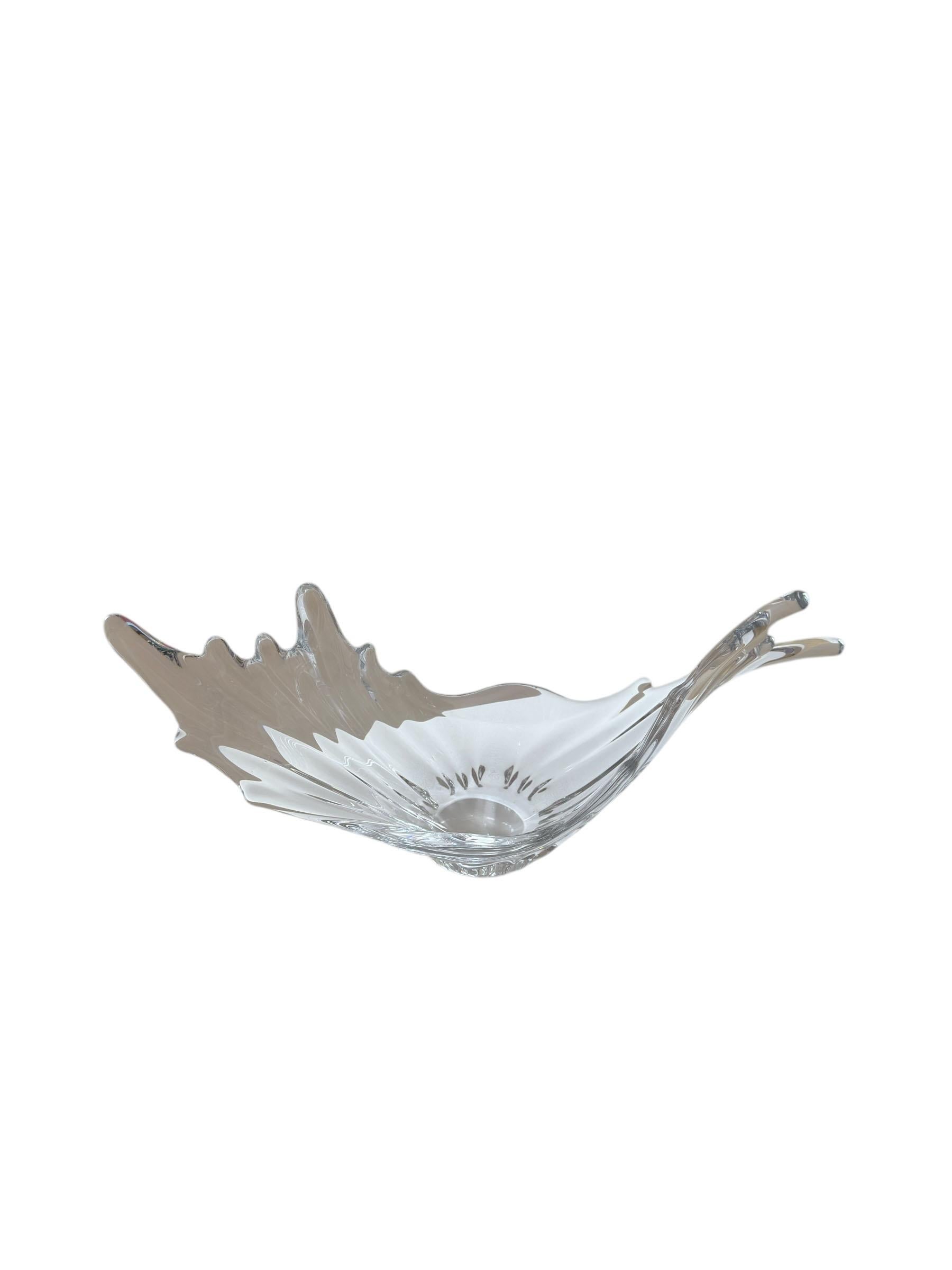 This large mid century crystal centerpiece bowl truly makes a statement and can be displayed on its own or be filled. A perfect look for any coastal retreat with its splashing wave design. Not signed but appears to be a French Vannes design circa
