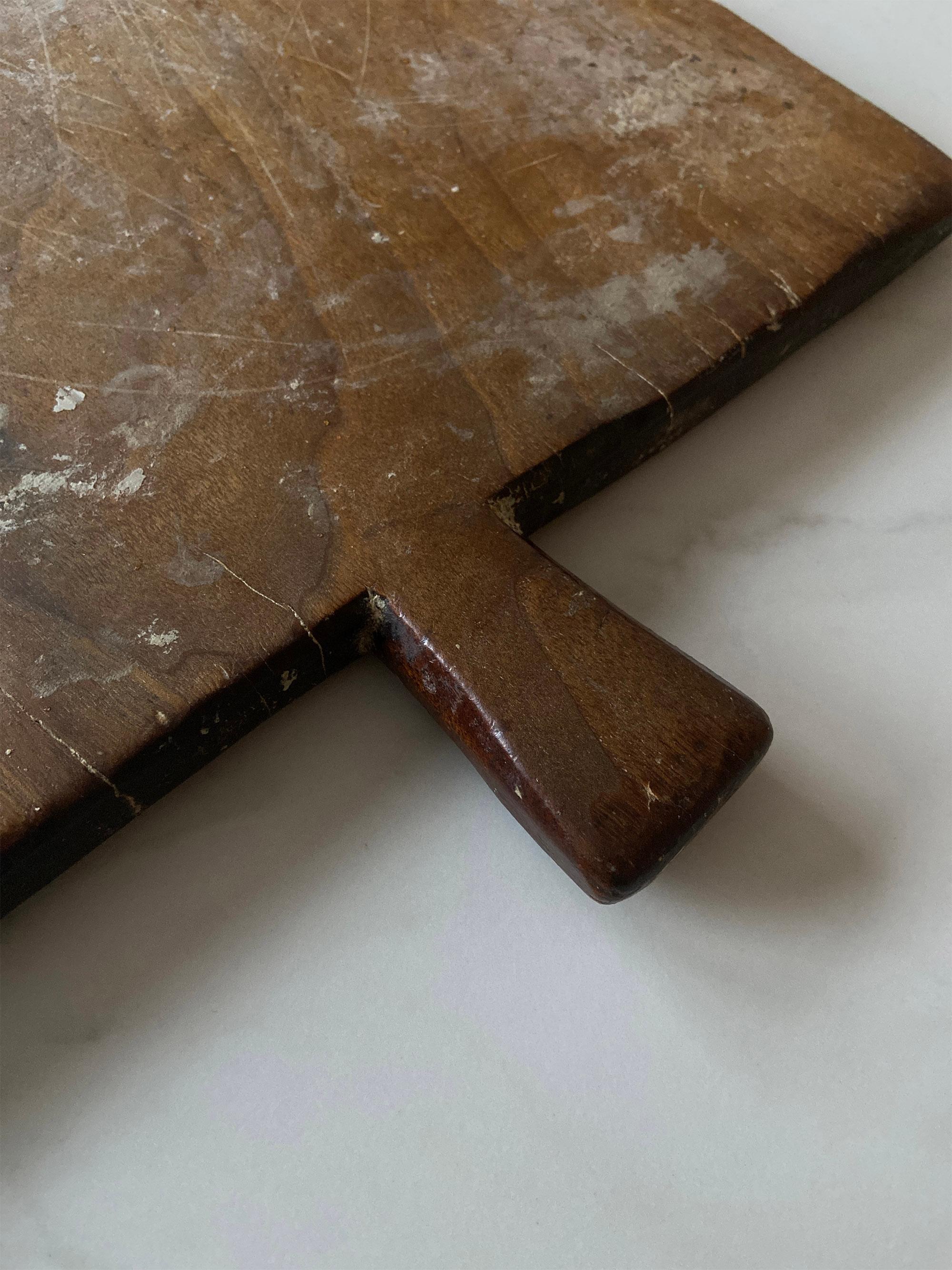 Shipping Note: 
If your region or country is not listed under the shipping options, don't hesitate to get in touch with us directly.

on offer is this very large French dark wood serving board. This unique piece was acquired in the south of France,