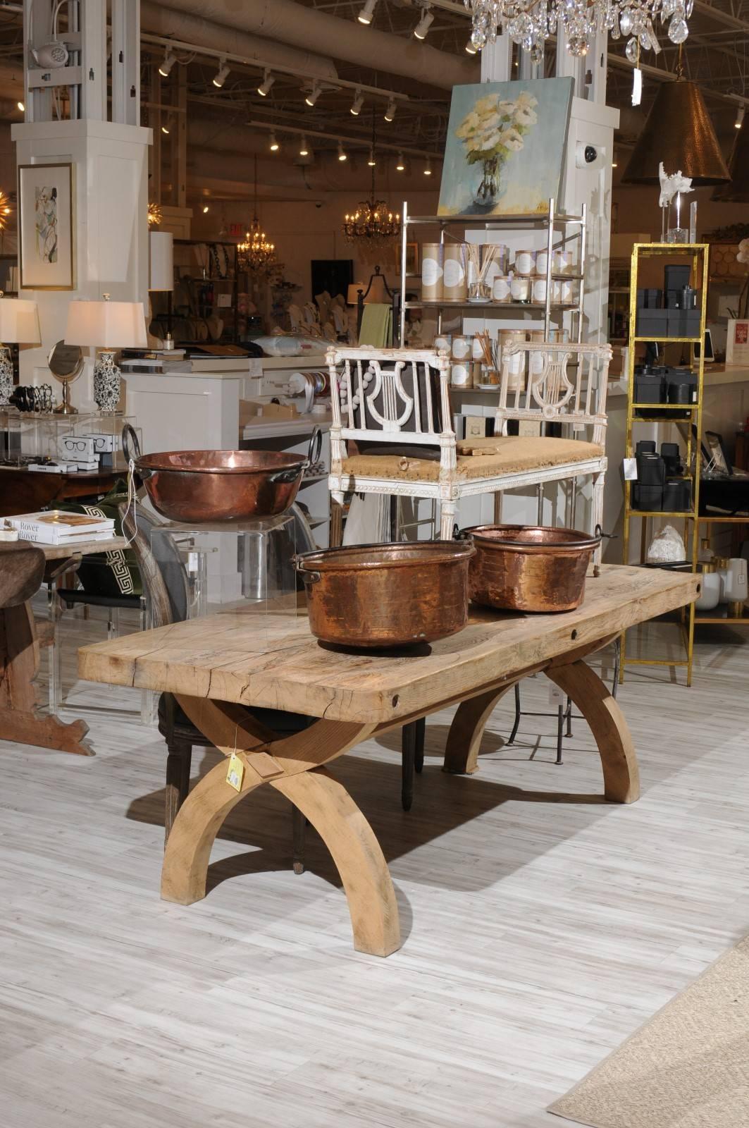 A French 1910s large round copper pot with iron handle. 