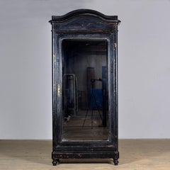 Large French ebonised mirror cabinet, circa 1850