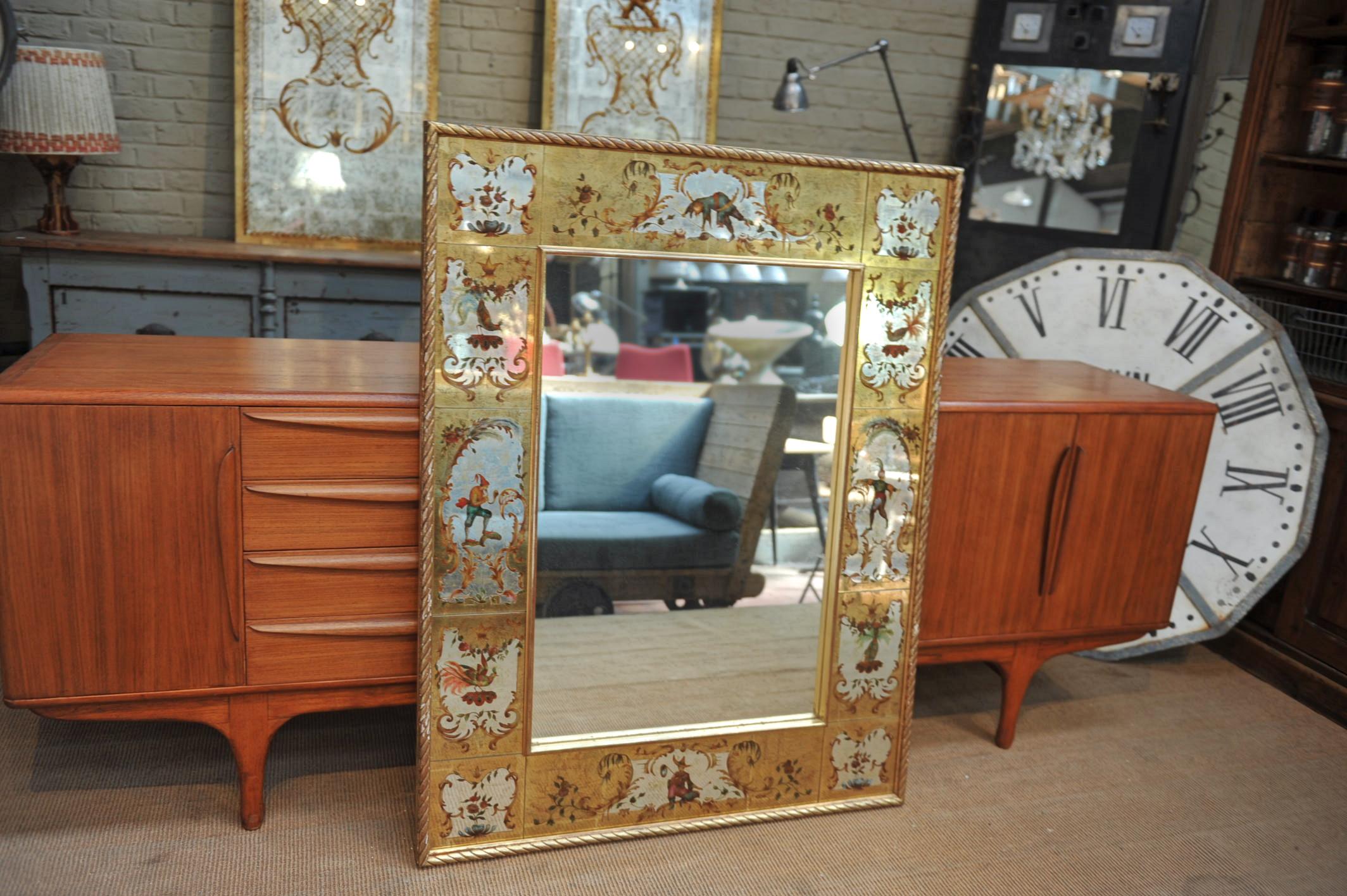 French reverse painted rectangular églomisé glass mirror Maison Jansen style Verre with giltwood frame.