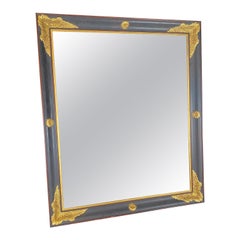 Grande specchio francese Impero in ebano, nero e oro, intagliato in legno dorato e gesso