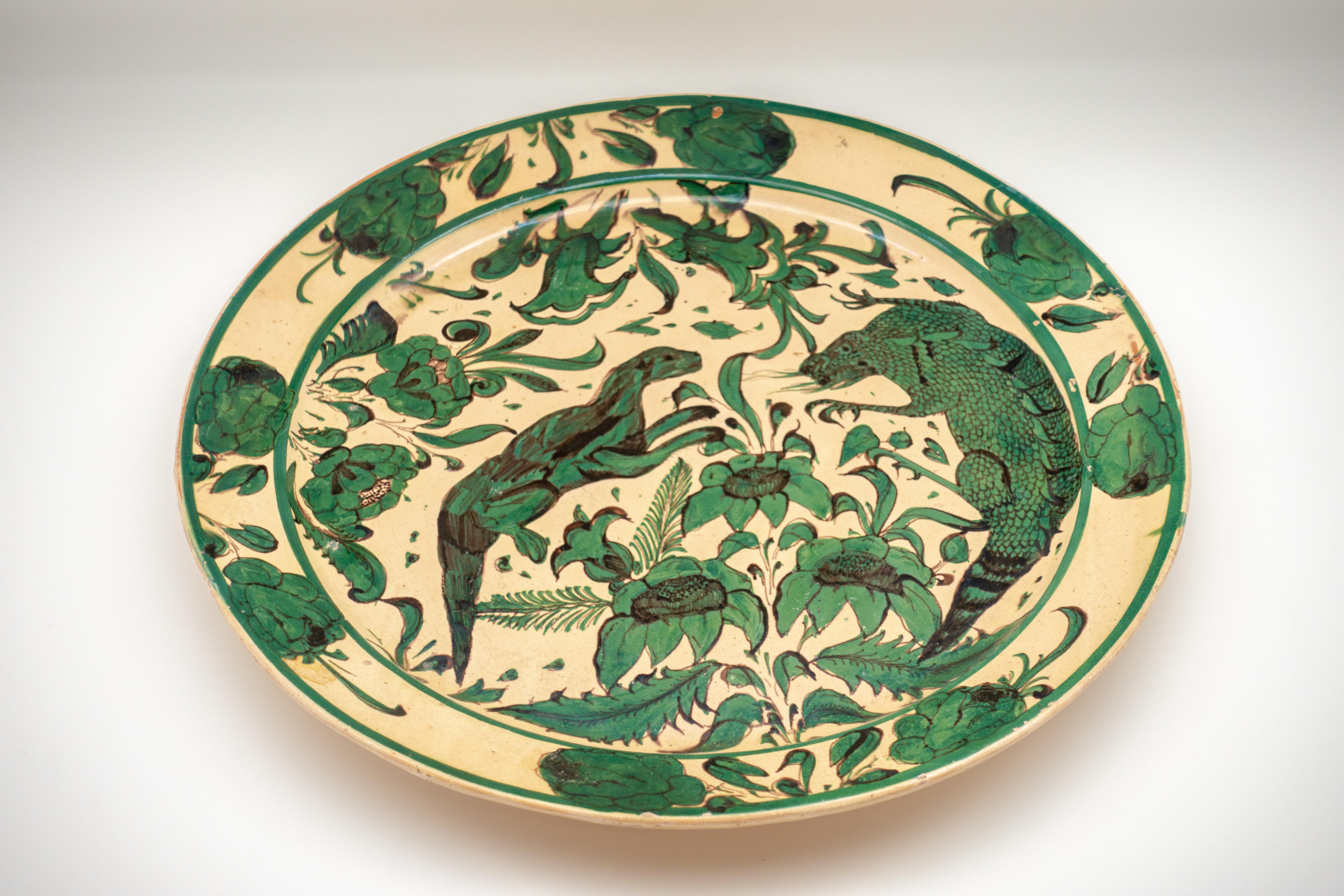 Vivid emerald green French faïence ceramic platter, circa 1850. Faïence is one of the oldest techniques used in ceramics; the discovery of faience in the ninth century and its diffusion in the West during the Renaissance allowed potters to begin to