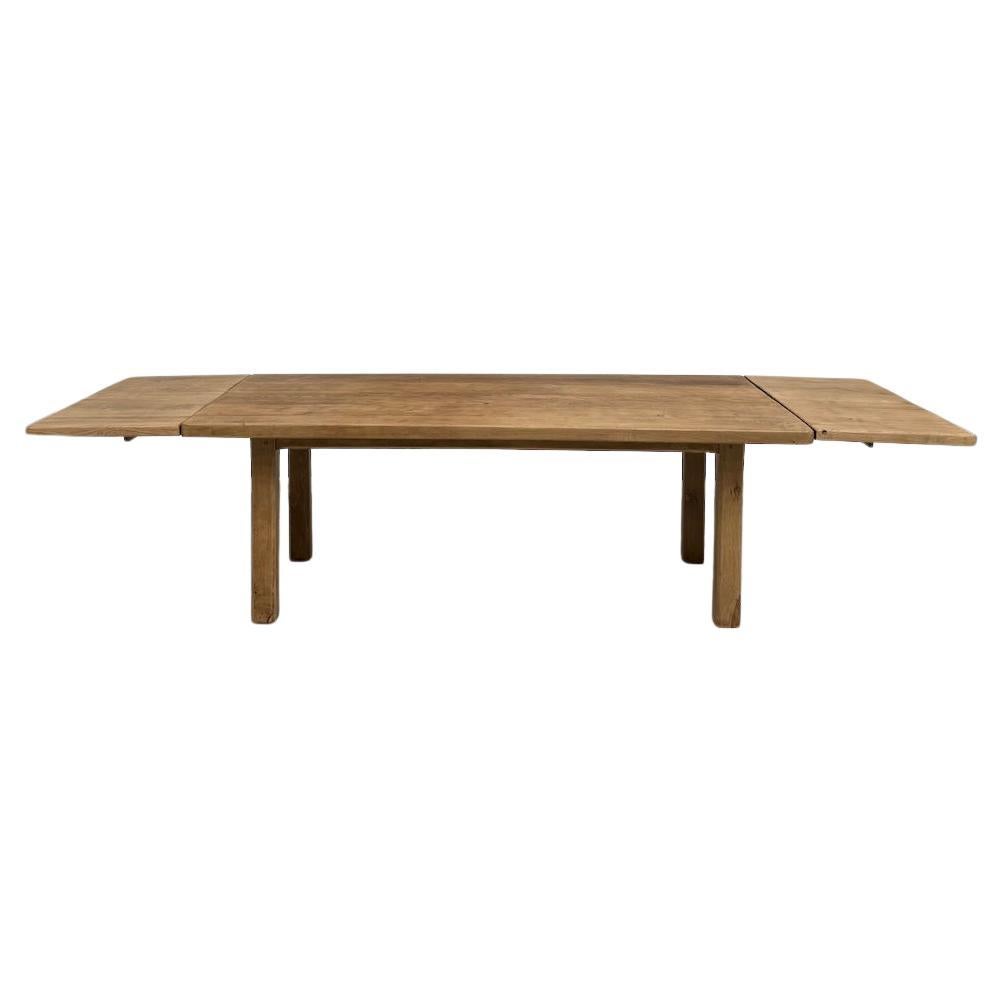 Large french farm table from the 60s, in solid oak, with extensions For Sale