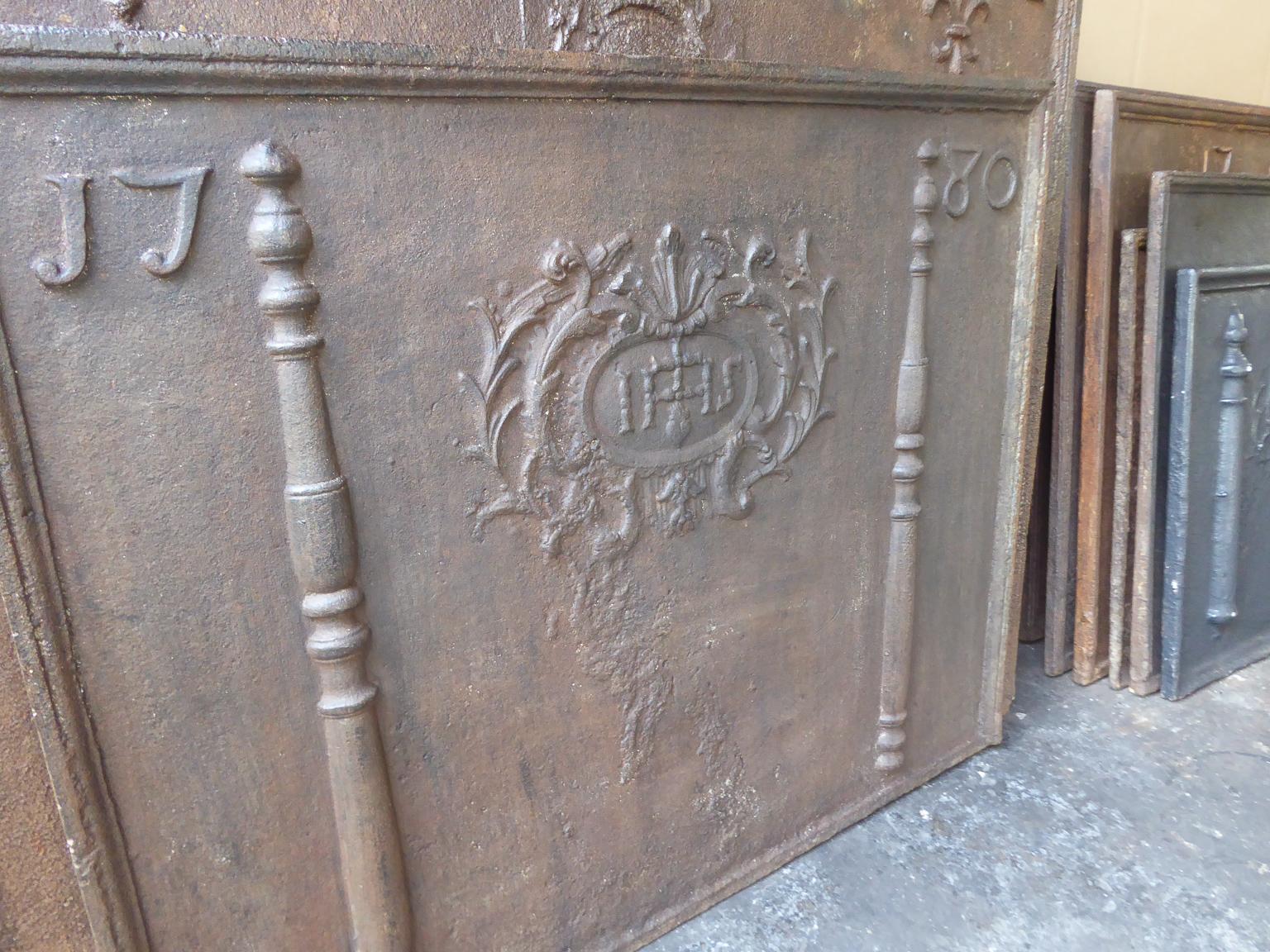 Iron Large French Fireback  / Backsplash with Pillars and IHS Monogram, Dated 1780 For Sale