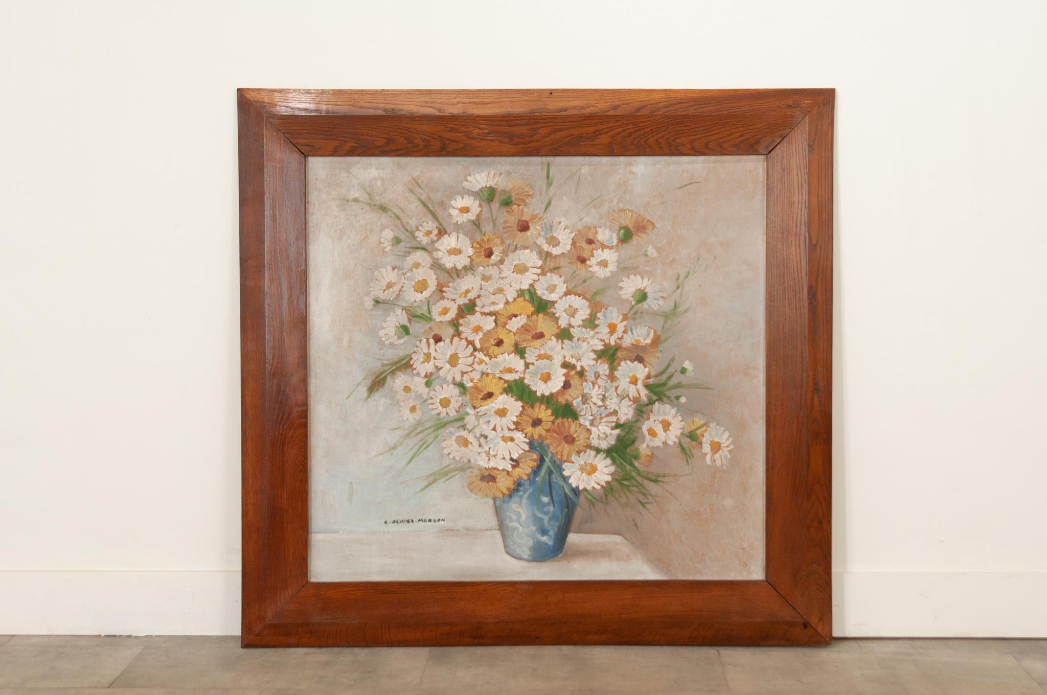 A lovely and large floral painting from France. Signed by the Artist C. Olivier-Merson. Framed in a large solid oak frame. Make sure to view all of the images for a closer look at the details.